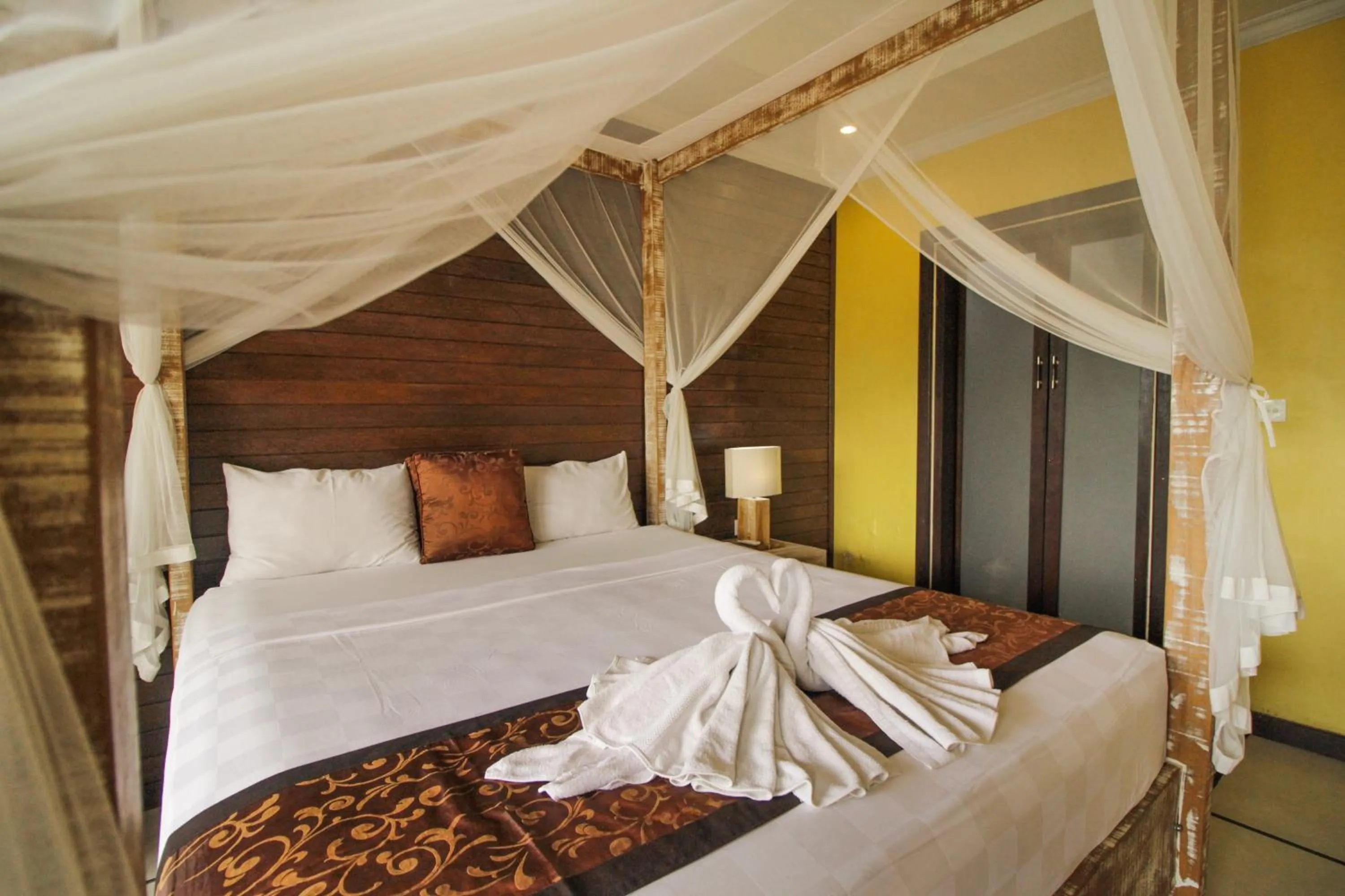 Bed in Pondok Kutuh Guest House