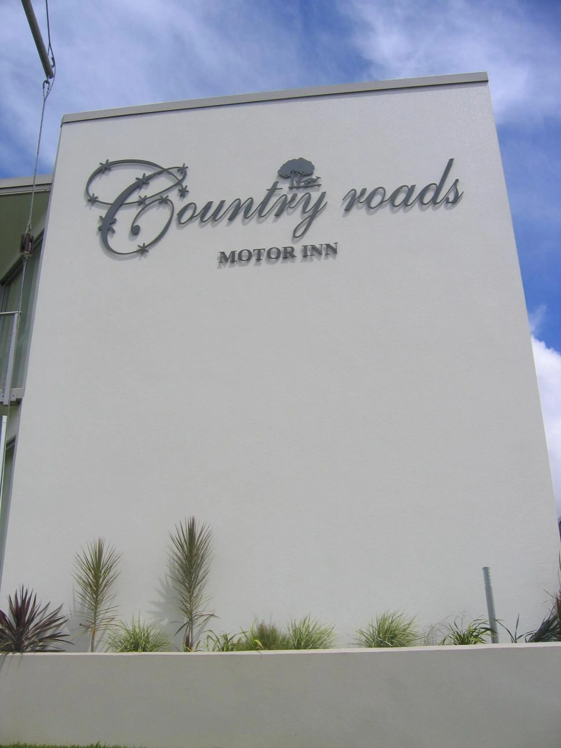 Property logo or sign in Country Roads Motor Inn Dysart