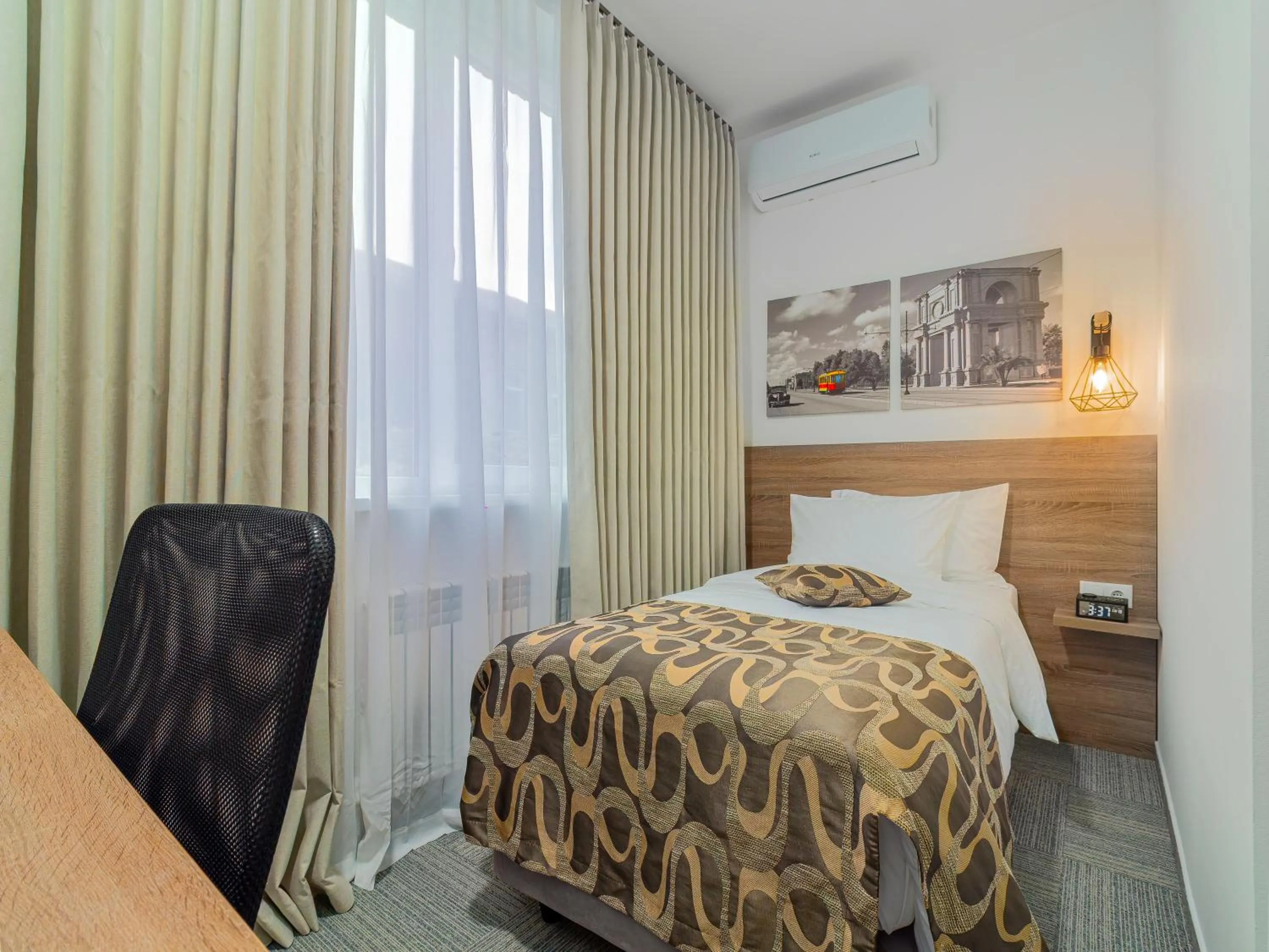 Bed in TA Collection Hotel