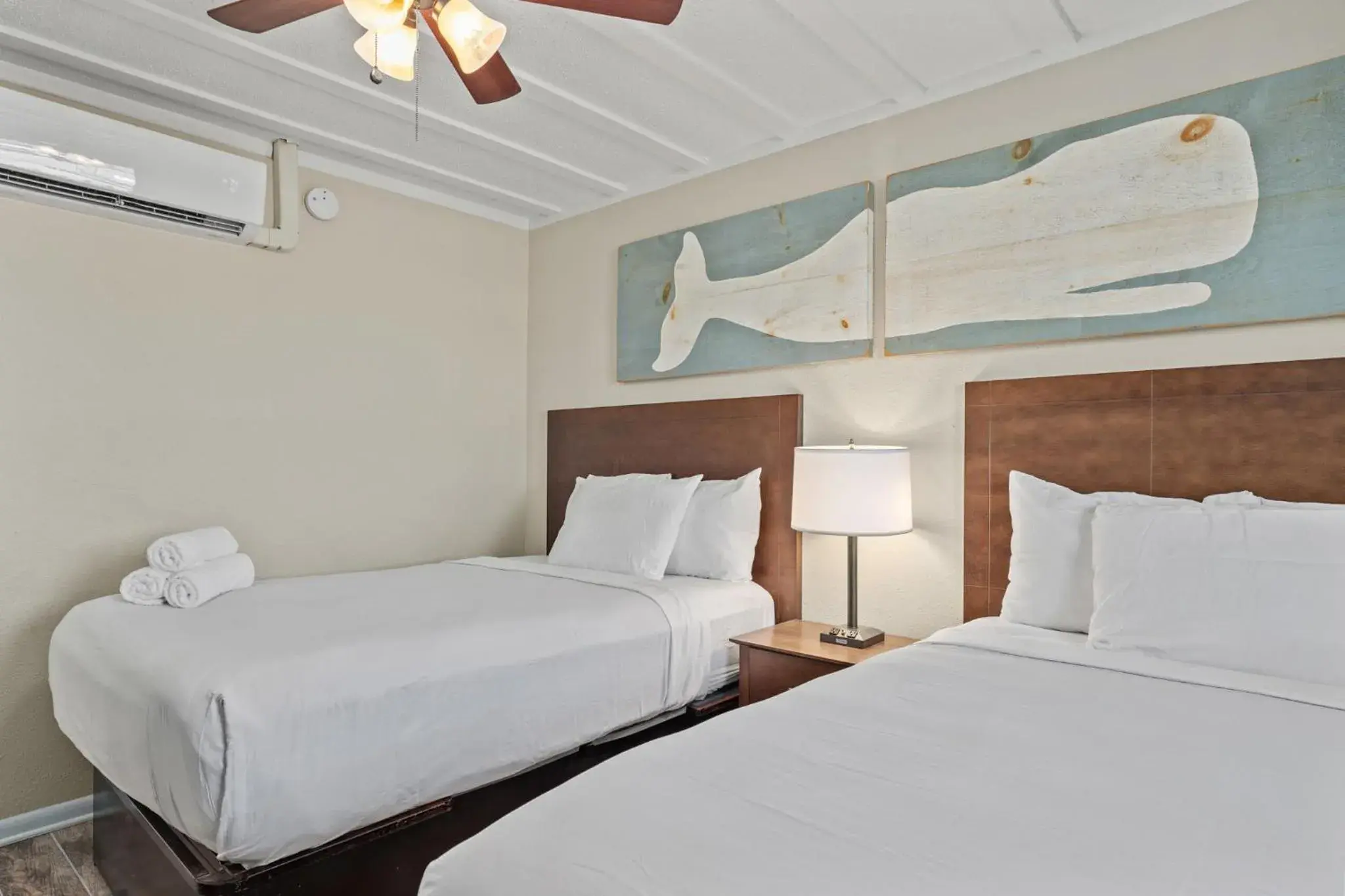 2 Bedroom Suite Four Double Beds w/ Sofa Sleeper Pool View Ground Floor in Sandpiper Beacon Beach Resort 2 Bedroom Suite Four Double Beds w/ Sofa Sleeper Pool View Ground Floor in Sandpiper Beacon Beach Resort