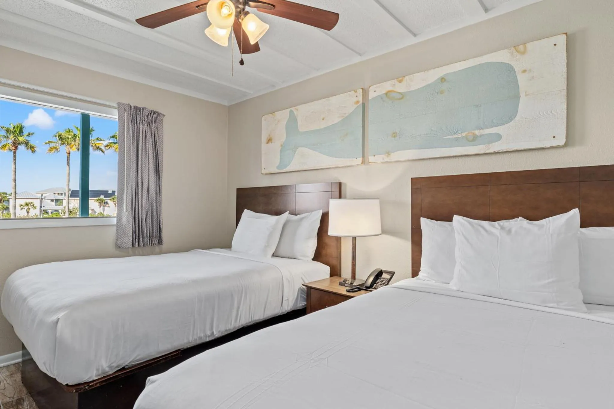 Bed in Sandpiper Beacon Beach Resort