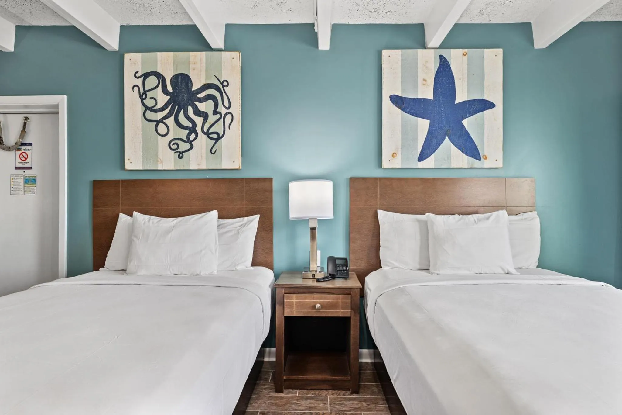 Bed in Sandpiper Beacon Beach Resort