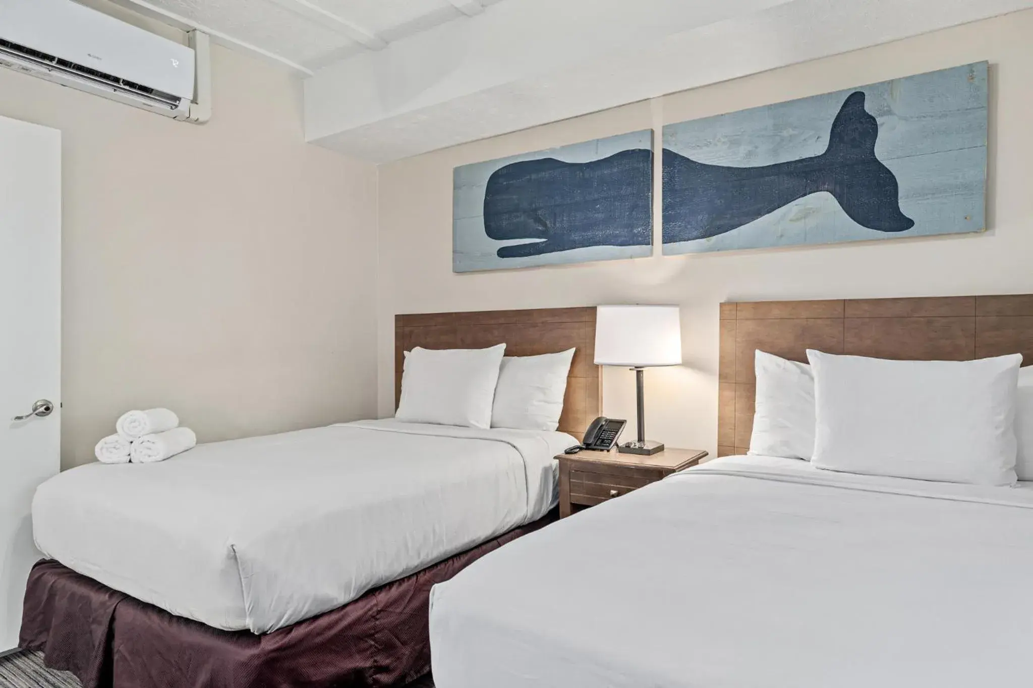 1 Bedroom Suite Two Double Beds w/ Sofa Sleeper Pool View in Sandpiper Beacon Beach Resort 1 Bedroom Suite Two Double Beds w/ Sofa Sleeper Pool View in Sandpiper Beacon Beach Resort