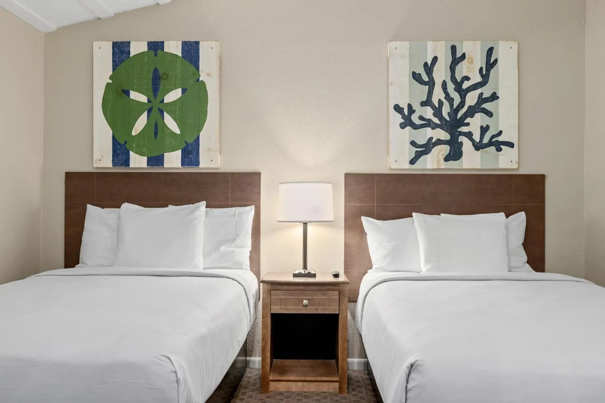 1 Bedroom Suite Three Double Beds w/ Sofa Sleeper Beachfront in Sandpiper Beacon Beach Resort 1 Bedroom Suite Three Double Beds w/ Sofa Sleeper Beachfront in Sandpiper Beacon Beach Resort