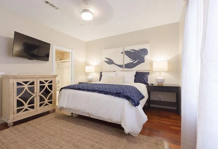 Bed in Sandpiper Beacon Beach Resort