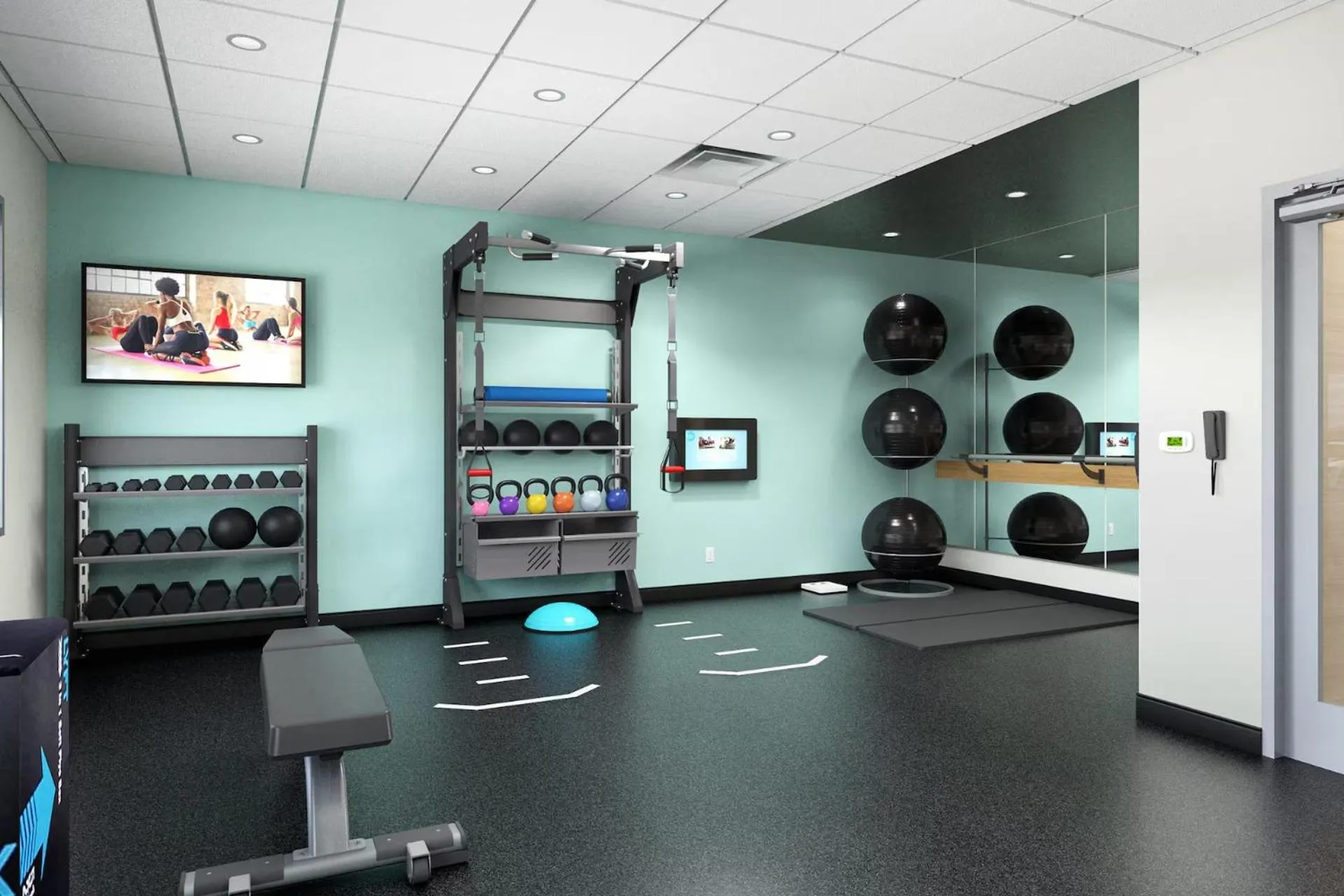 Fitness centre/facilities in Tru By Hilton Madison East