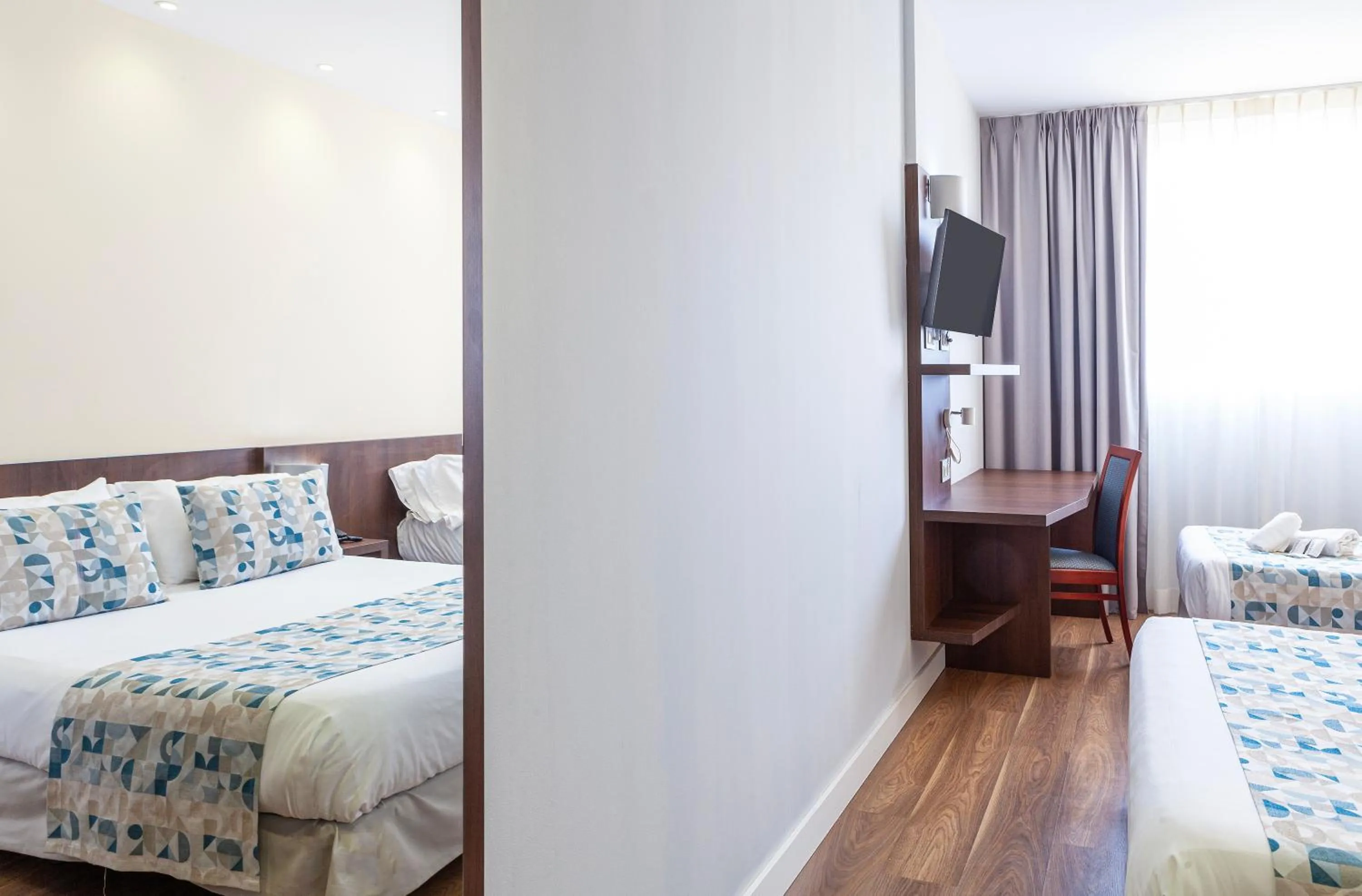 Decorative detail, Bed in Hotel Olympia Universidades