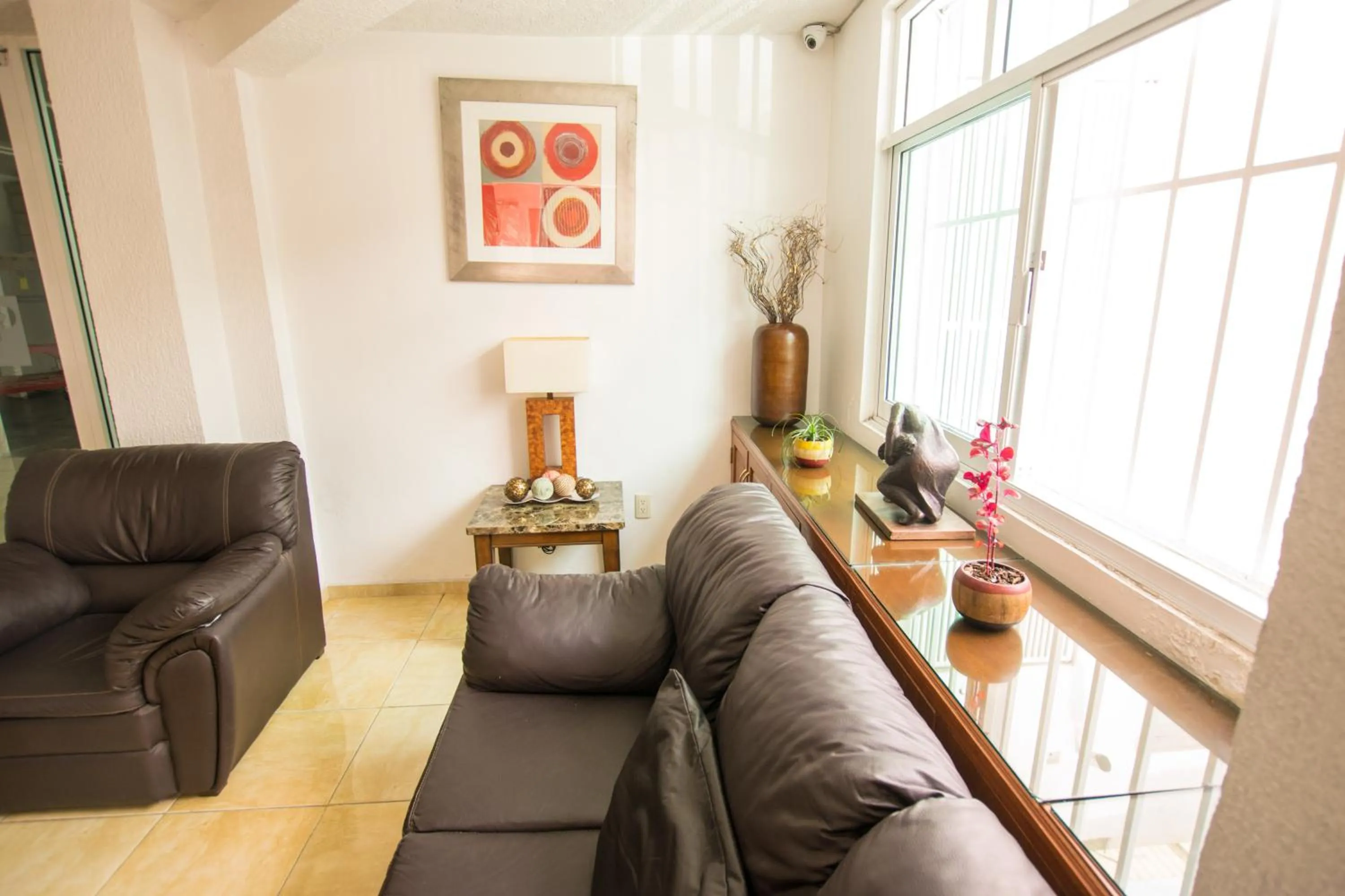 Living room in Suites Poliforum Inn