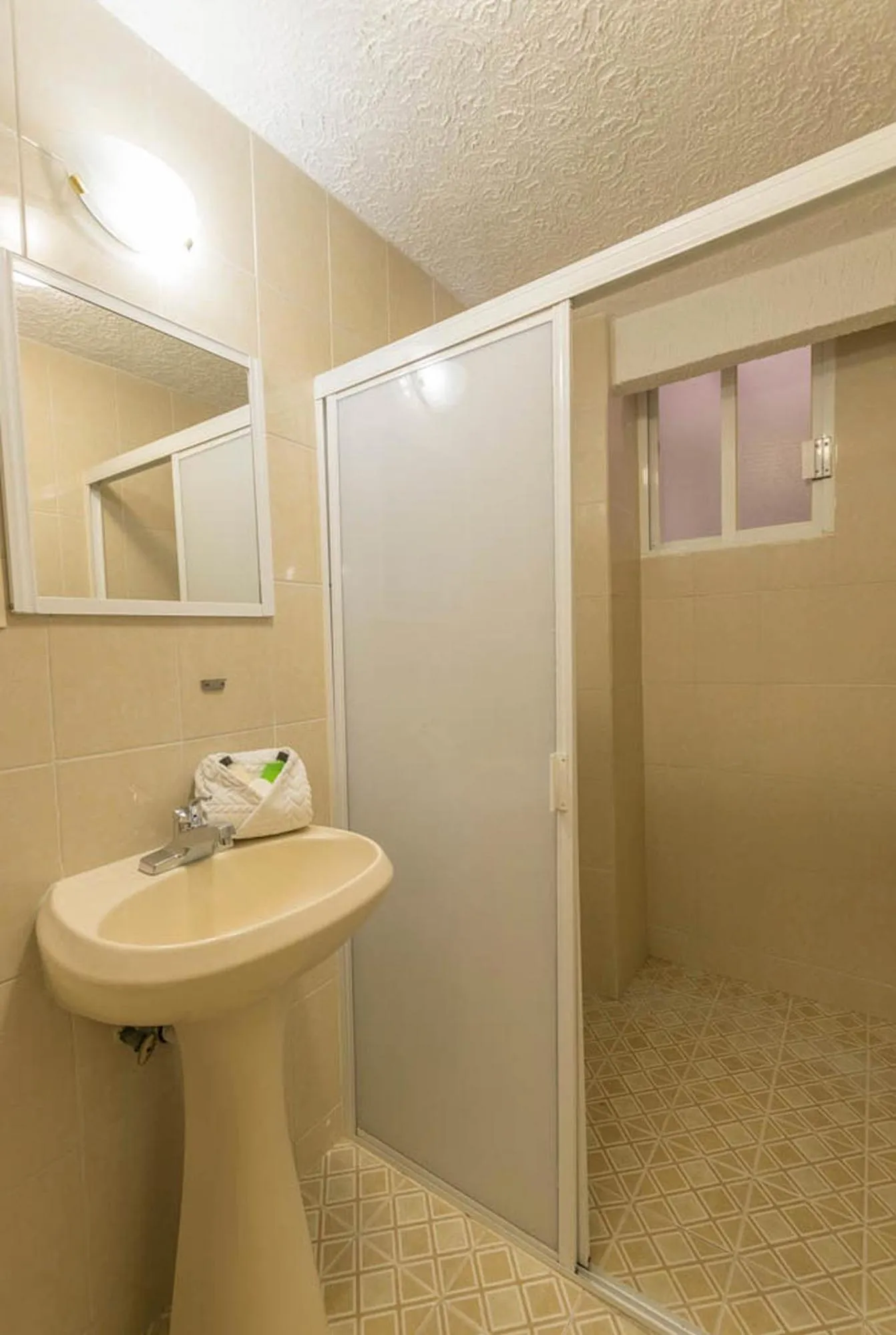 Bathroom in Suites Poliforum Inn