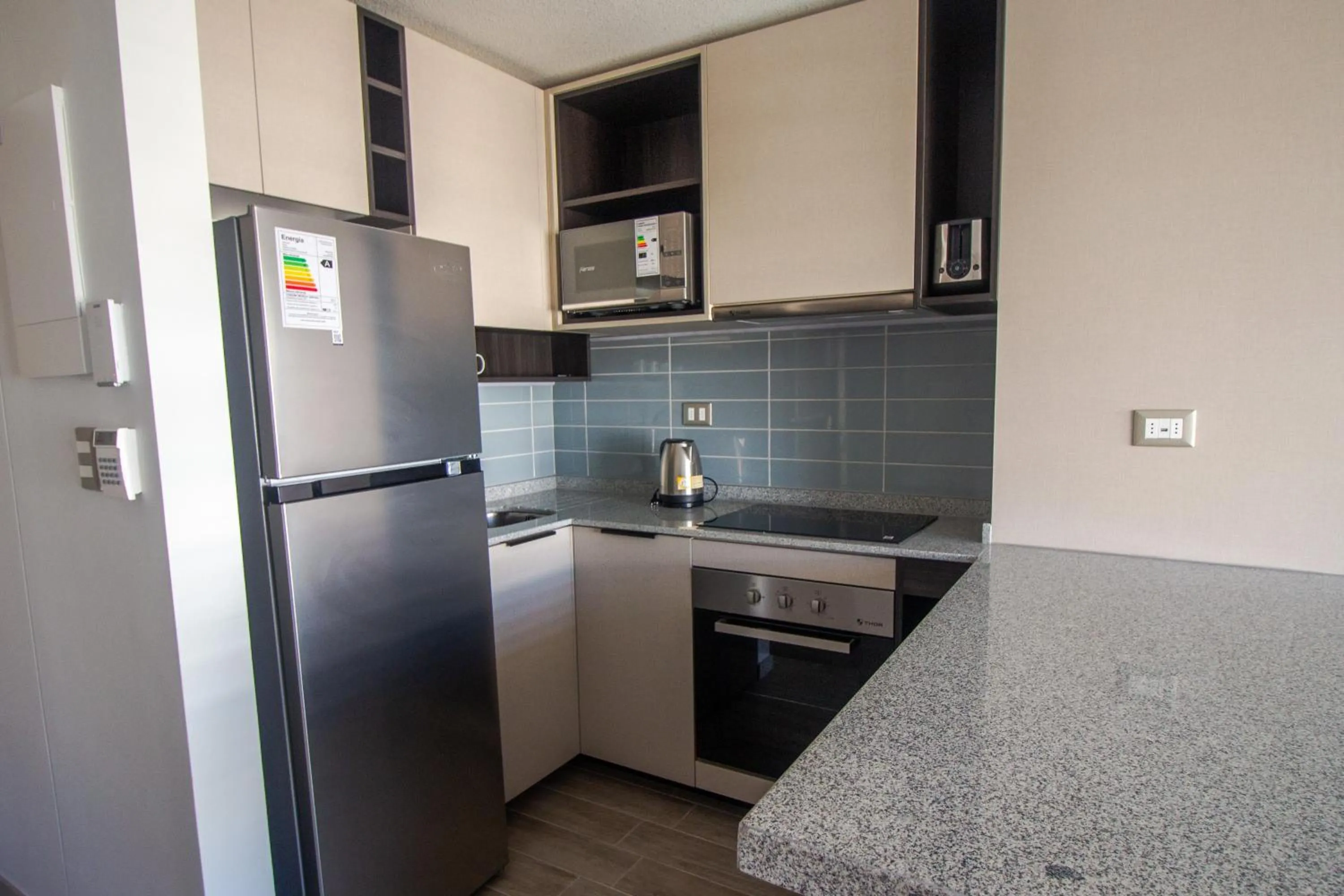 Kitchen or kitchenette in Oceana Suites Movistar Arena I Eco España