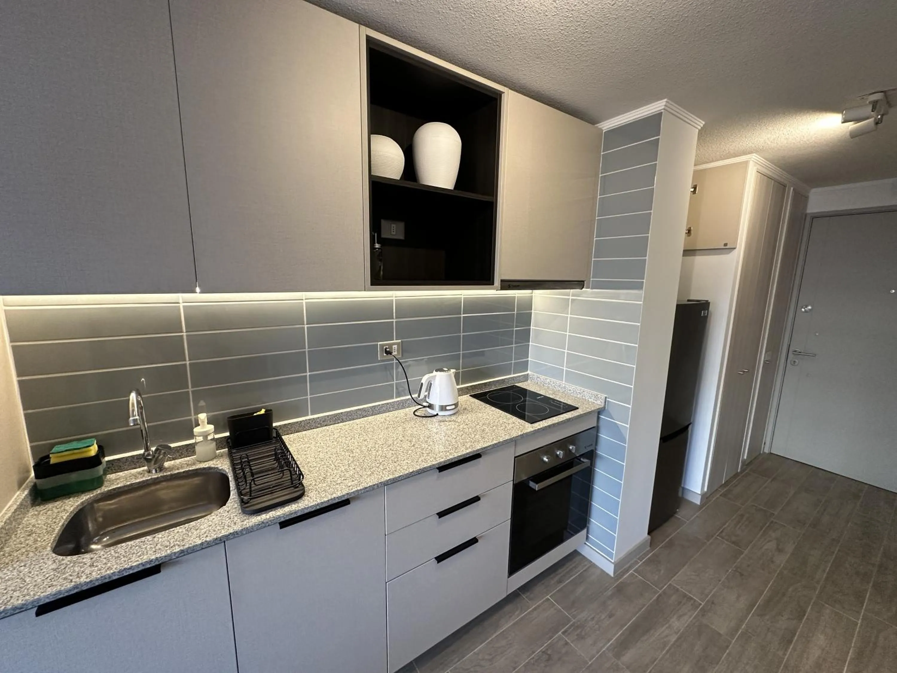 Kitchen or kitchenette in Oceana Suites Movistar Arena I Eco España
