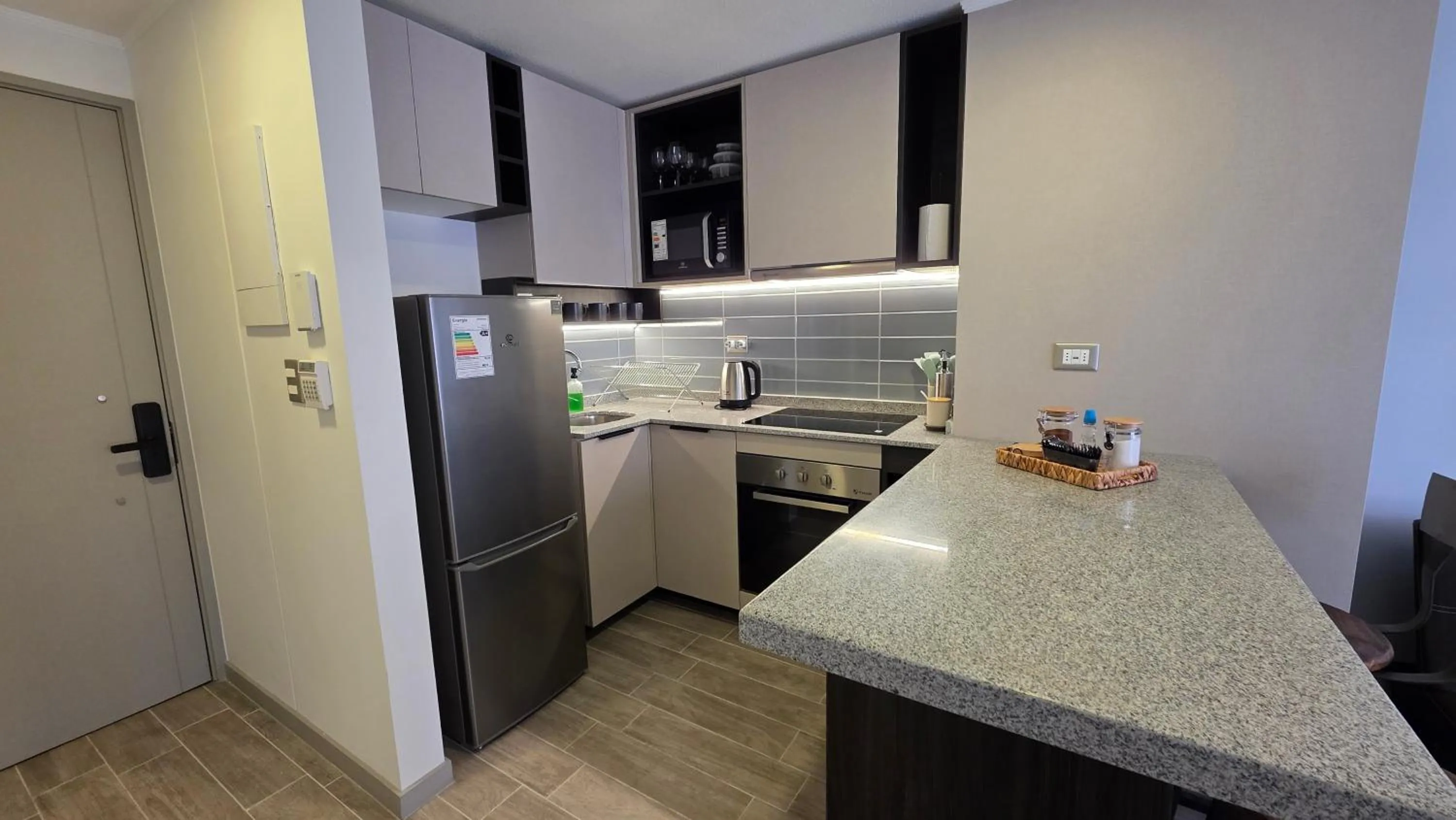 Kitchen or kitchenette in Oceana Suites Movistar Arena I Eco España
