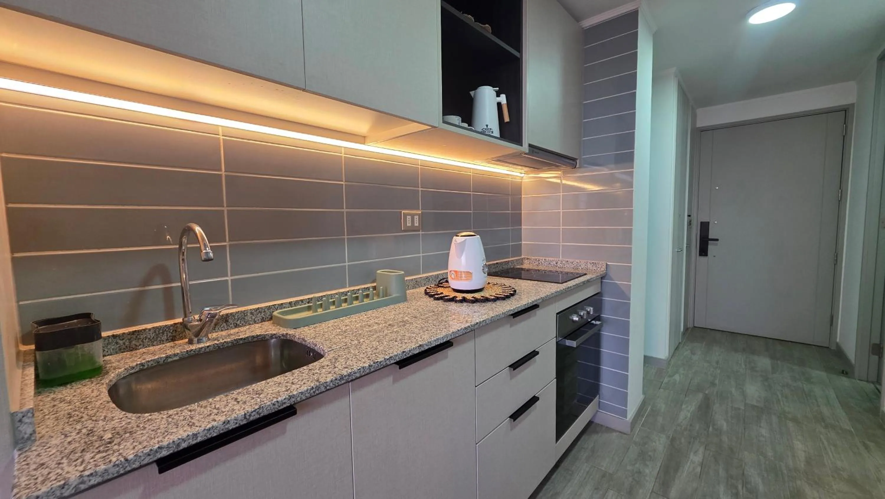 Kitchen or kitchenette in Oceana Suites Movistar Arena I Eco España