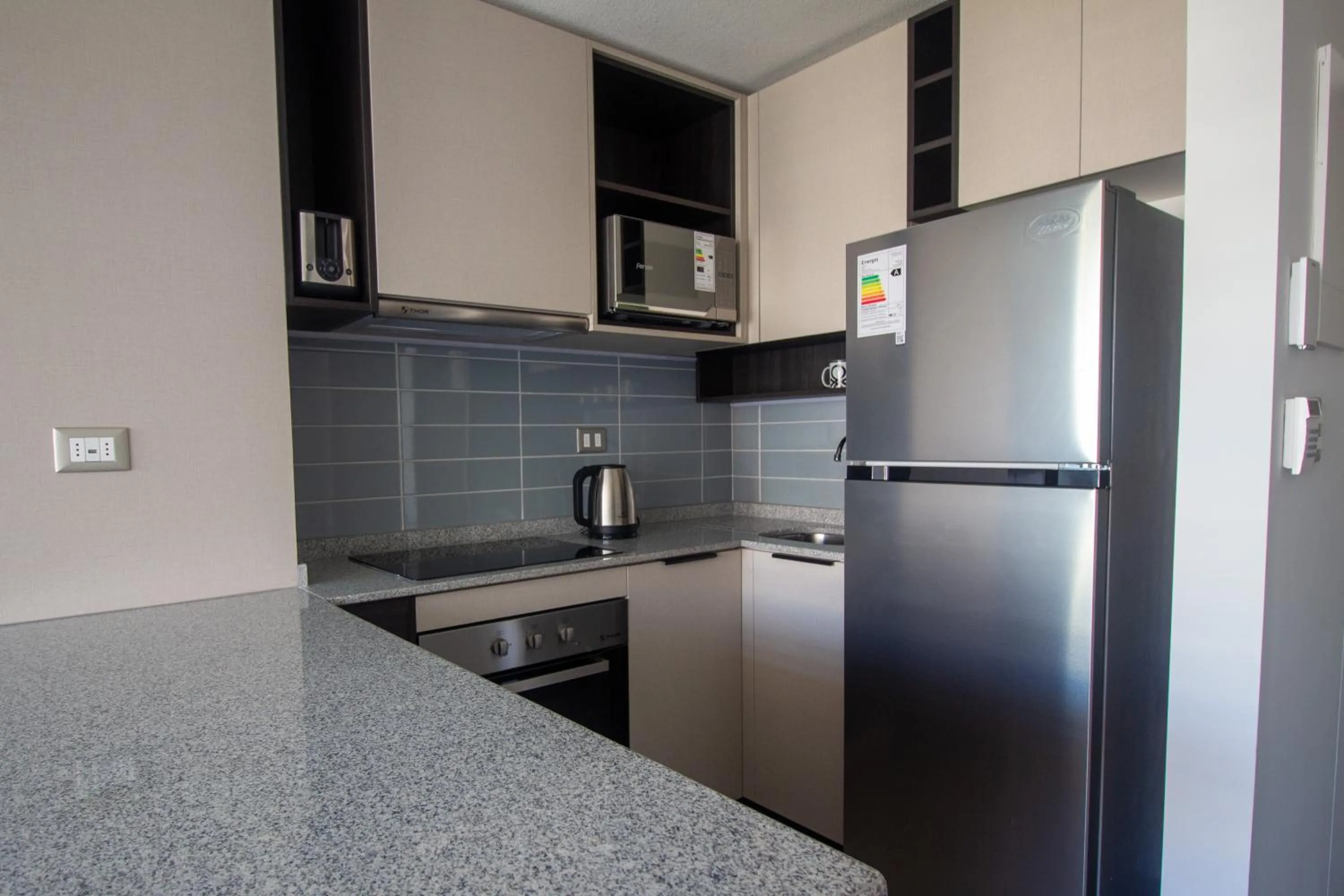 Kitchen or kitchenette in Oceana Suites Movistar Arena I Eco España