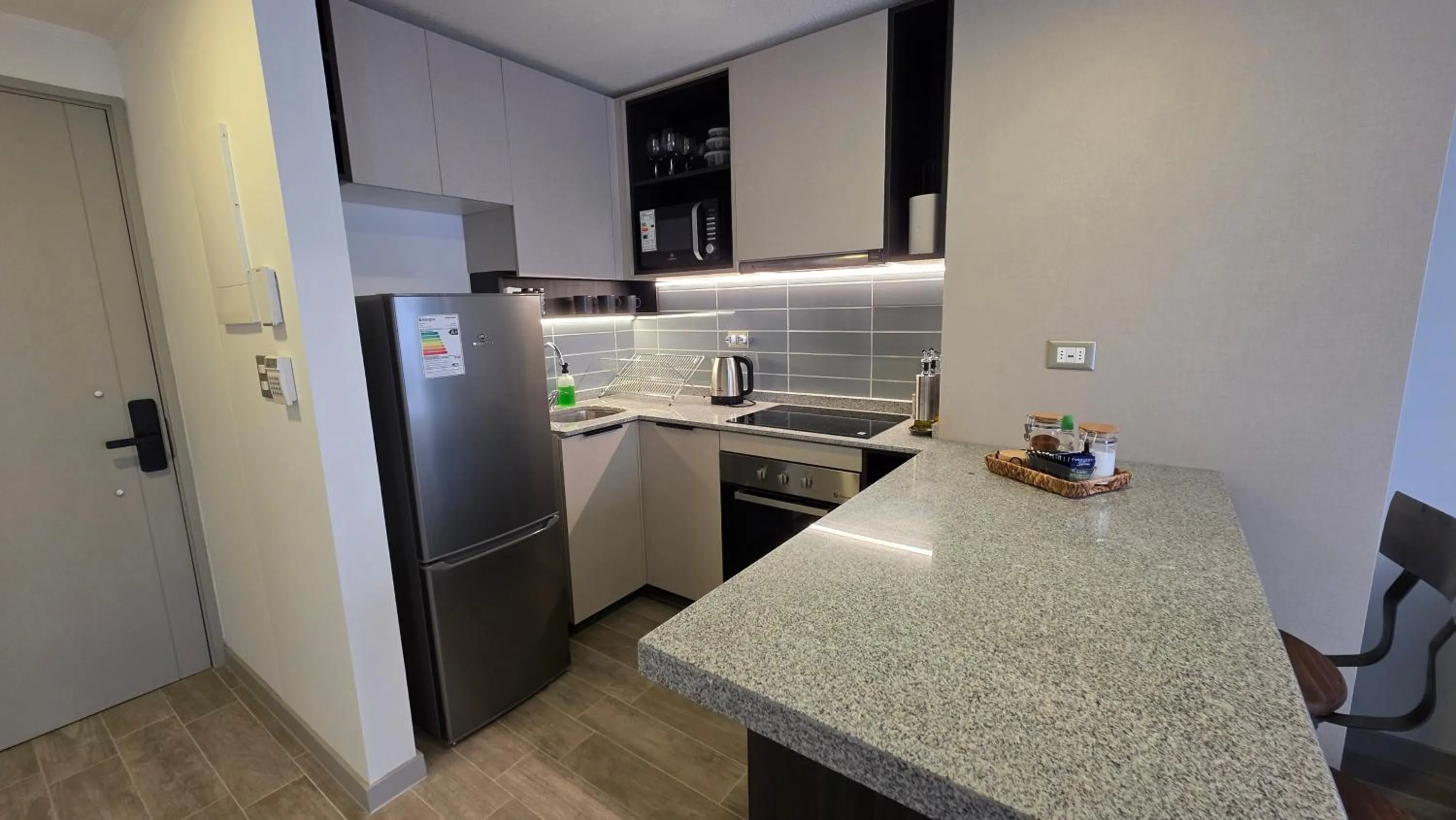Kitchen or kitchenette in Oceana Suites Movistar Arena I Eco España