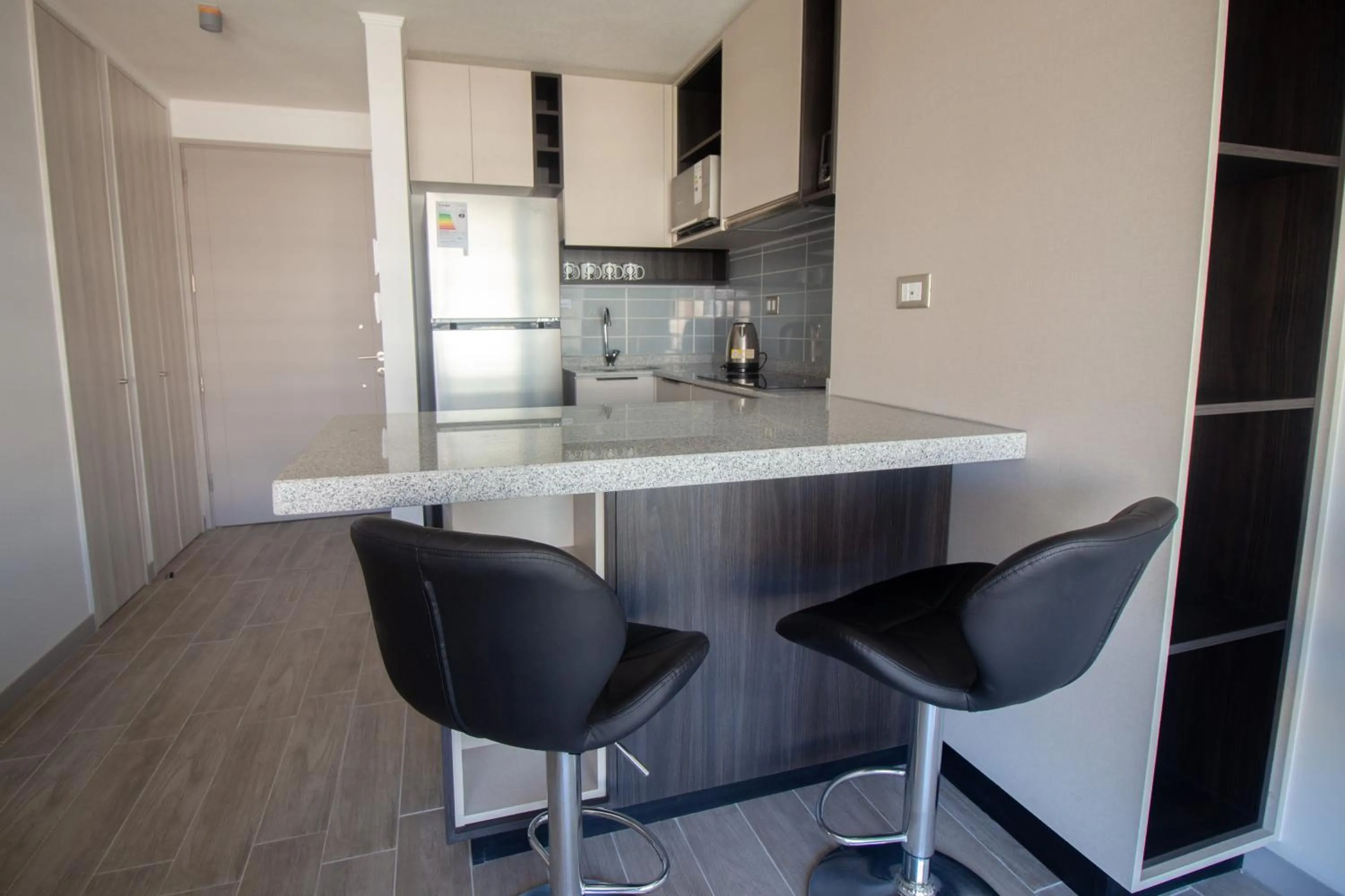 Kitchen or kitchenette in Oceana Suites Movistar Arena I Eco España