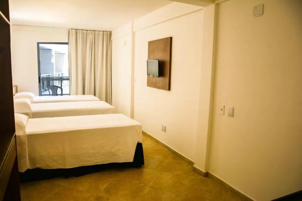 Bed in Happy Hotel Ponta Negra