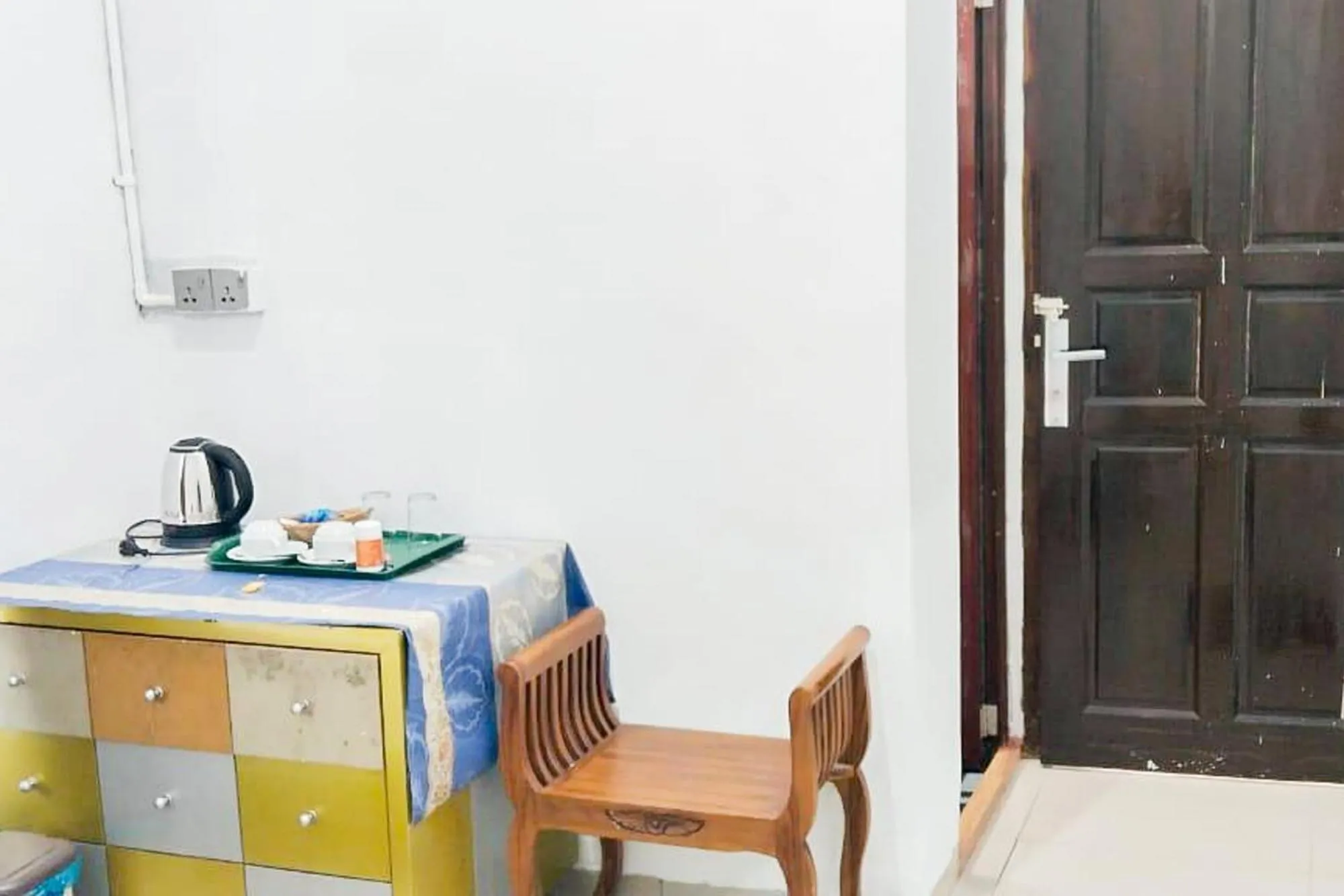 Seating area in RedDoorz Syariah at Sayang Ibu Village Nongsa Batam