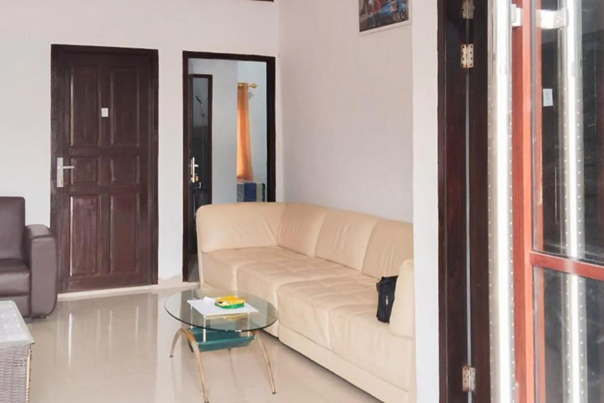 Seating area in RedDoorz Syariah at Sayang Ibu Village Nongsa Batam