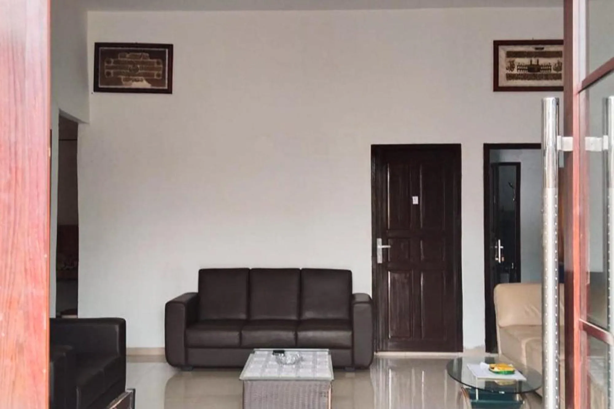 Seating area in RedDoorz Syariah at Sayang Ibu Village Nongsa Batam