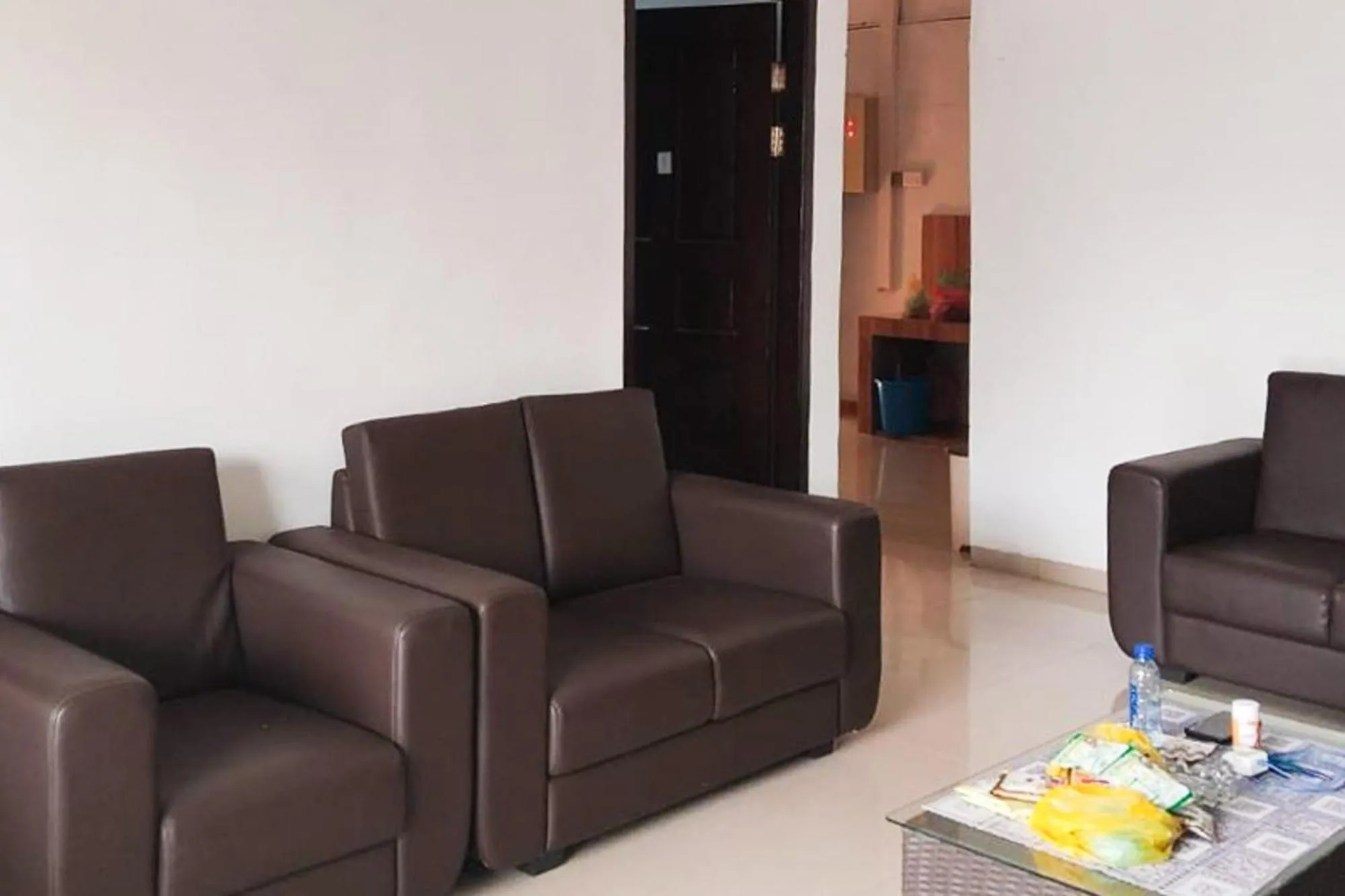 Seating area in RedDoorz Syariah at Sayang Ibu Village Nongsa Batam