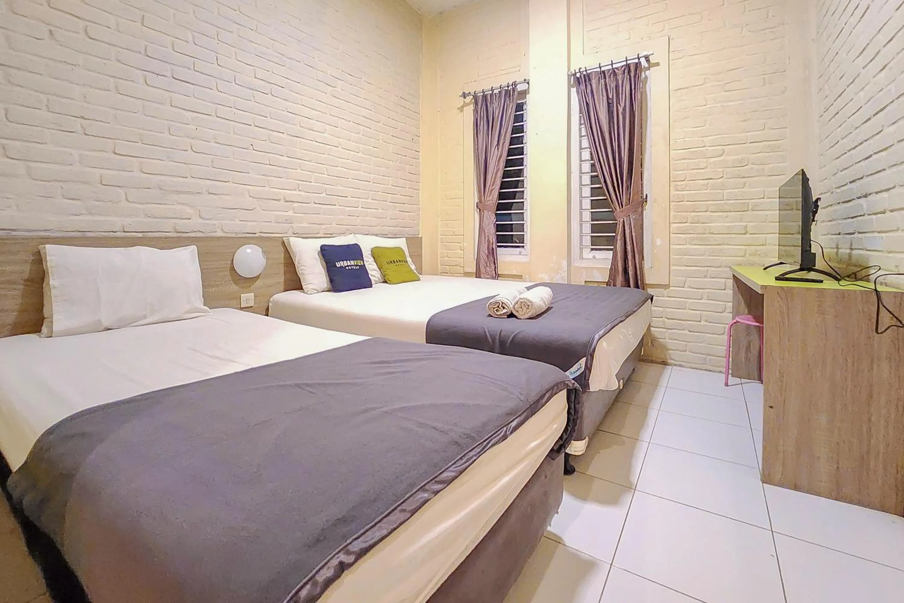 Bedroom, Bed in Urbanview Hotel Star Residence Puncak