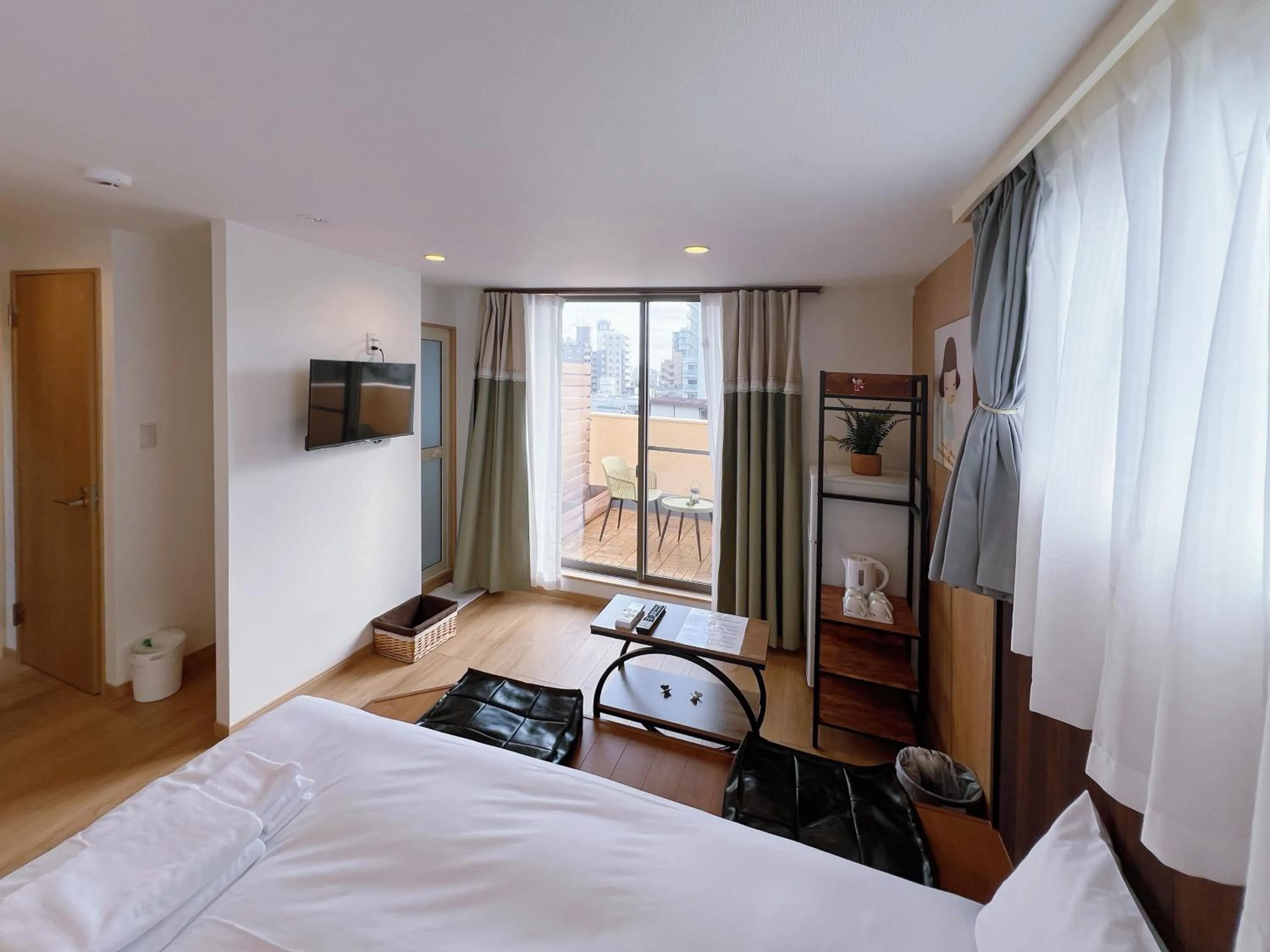 Seating area, Bed in Softlight Inn Asakusa Tokyo