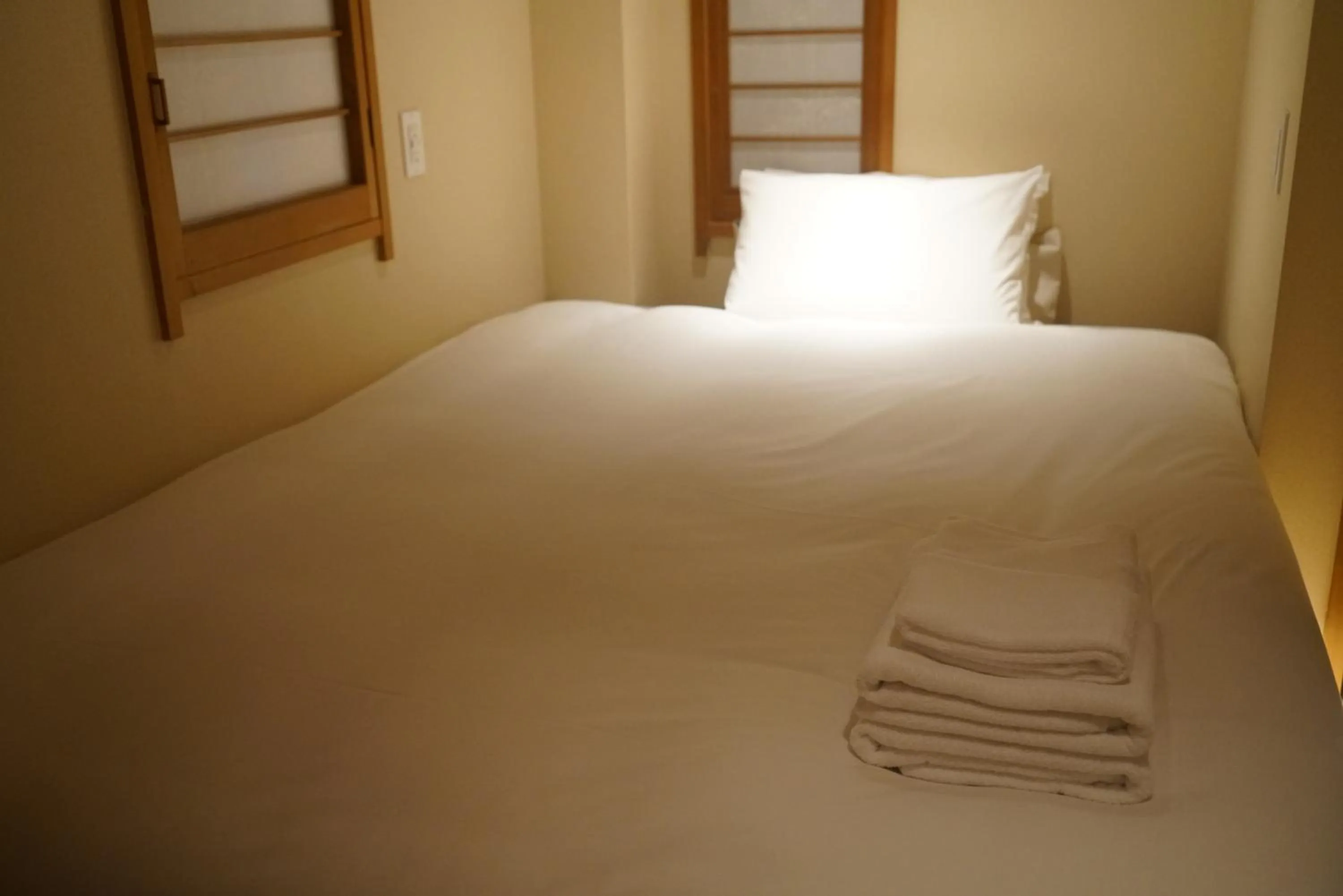 Bed in Softlight Inn Asakusa Tokyo