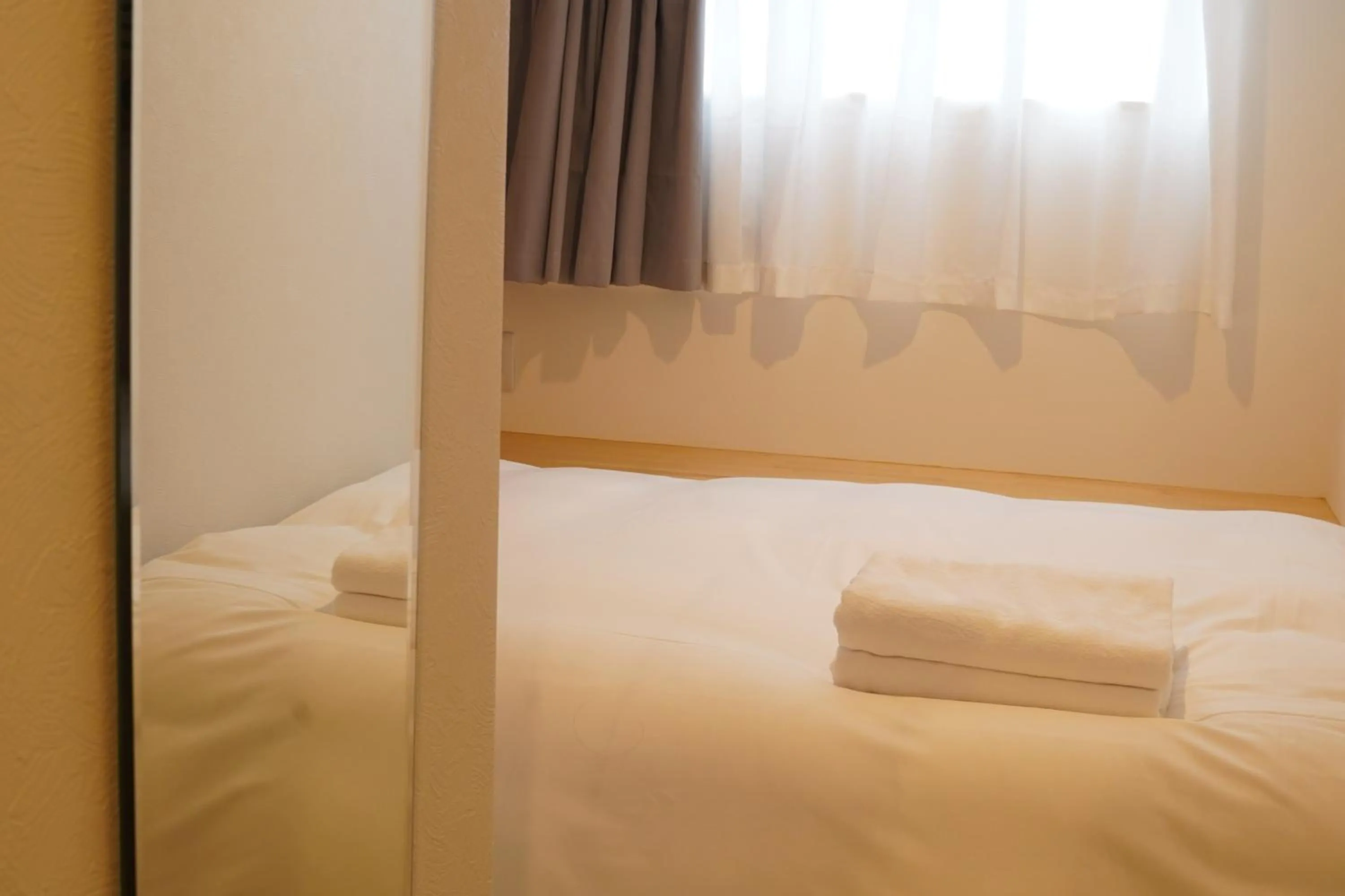 Bed in Softlight Inn Asakusa Tokyo