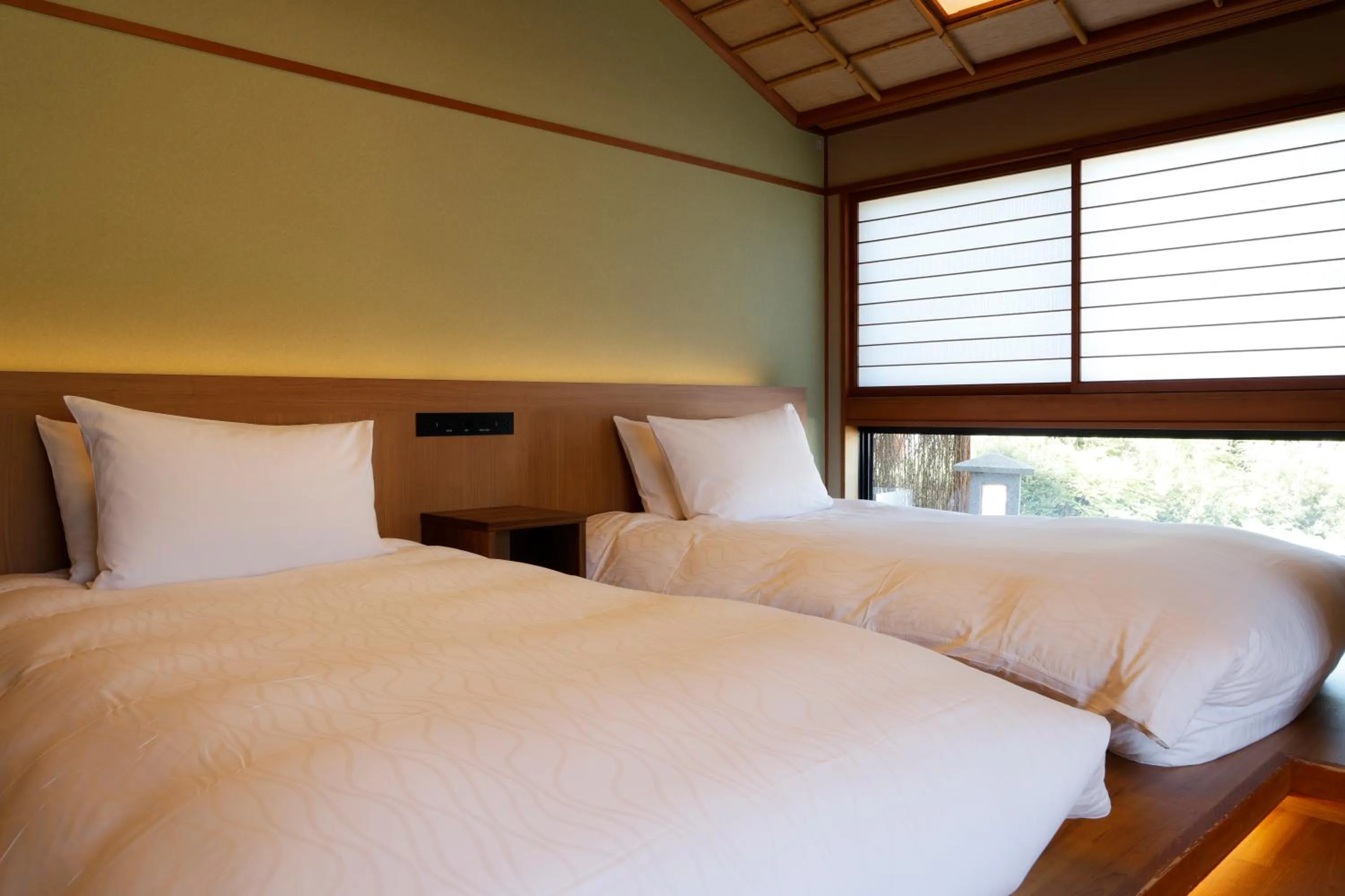 Bed in Kinosakinoyado Ryokufukaku