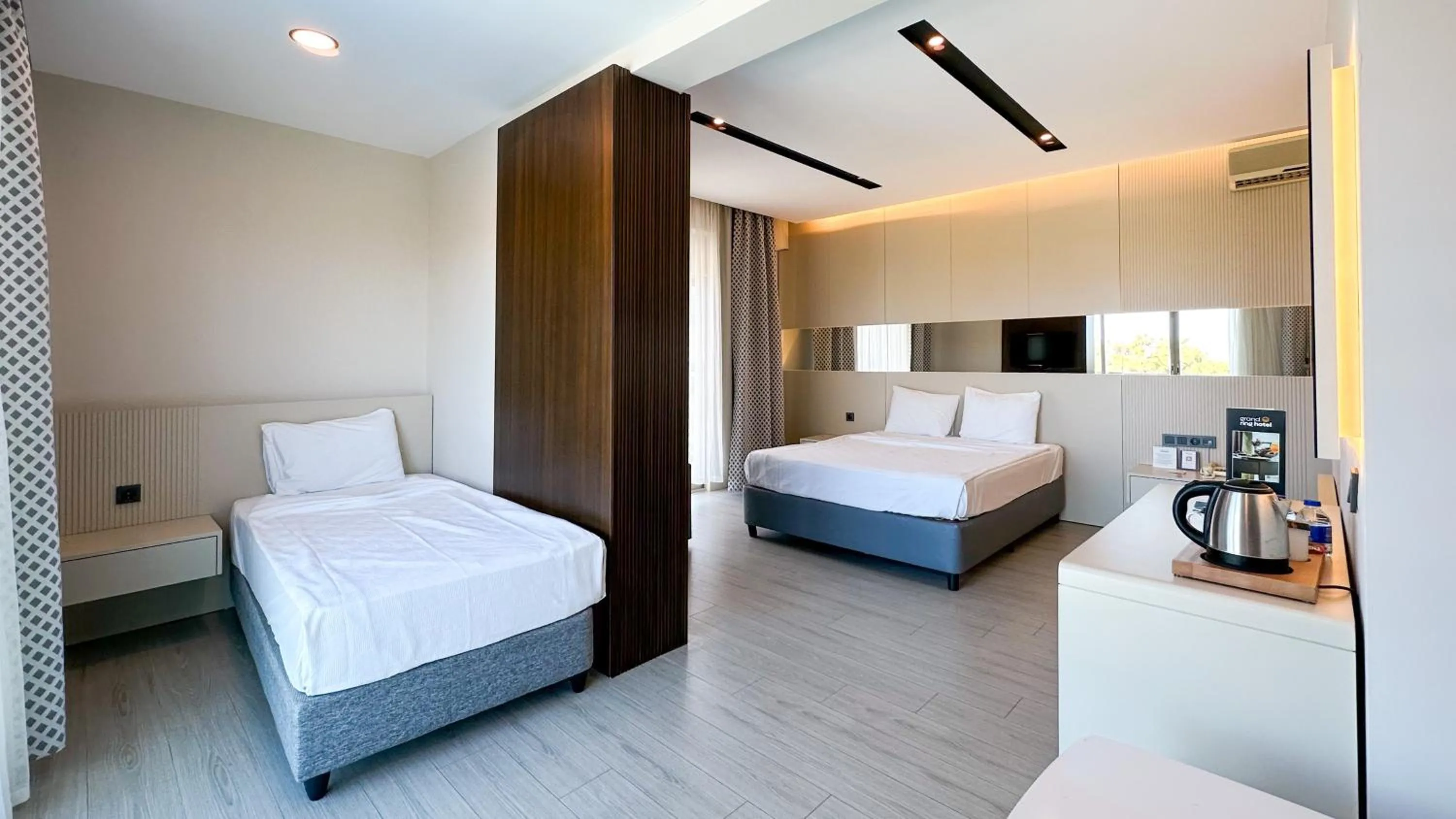 Bed in Grand Ring Hotel