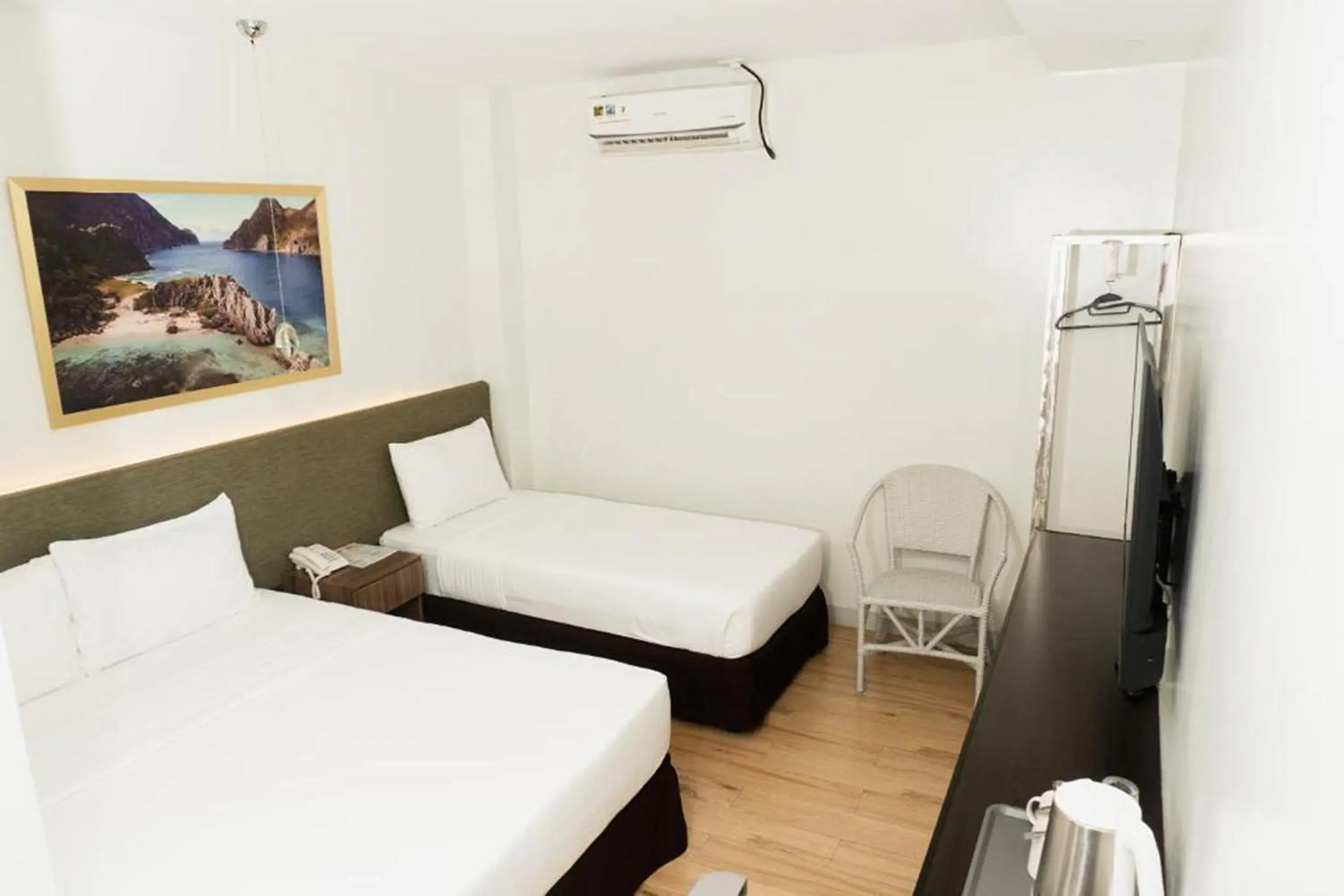 Deluxe Triple Room in Madison Suites Mactan Cebu Deluxe Triple Room in Madison Suites Mactan Cebu