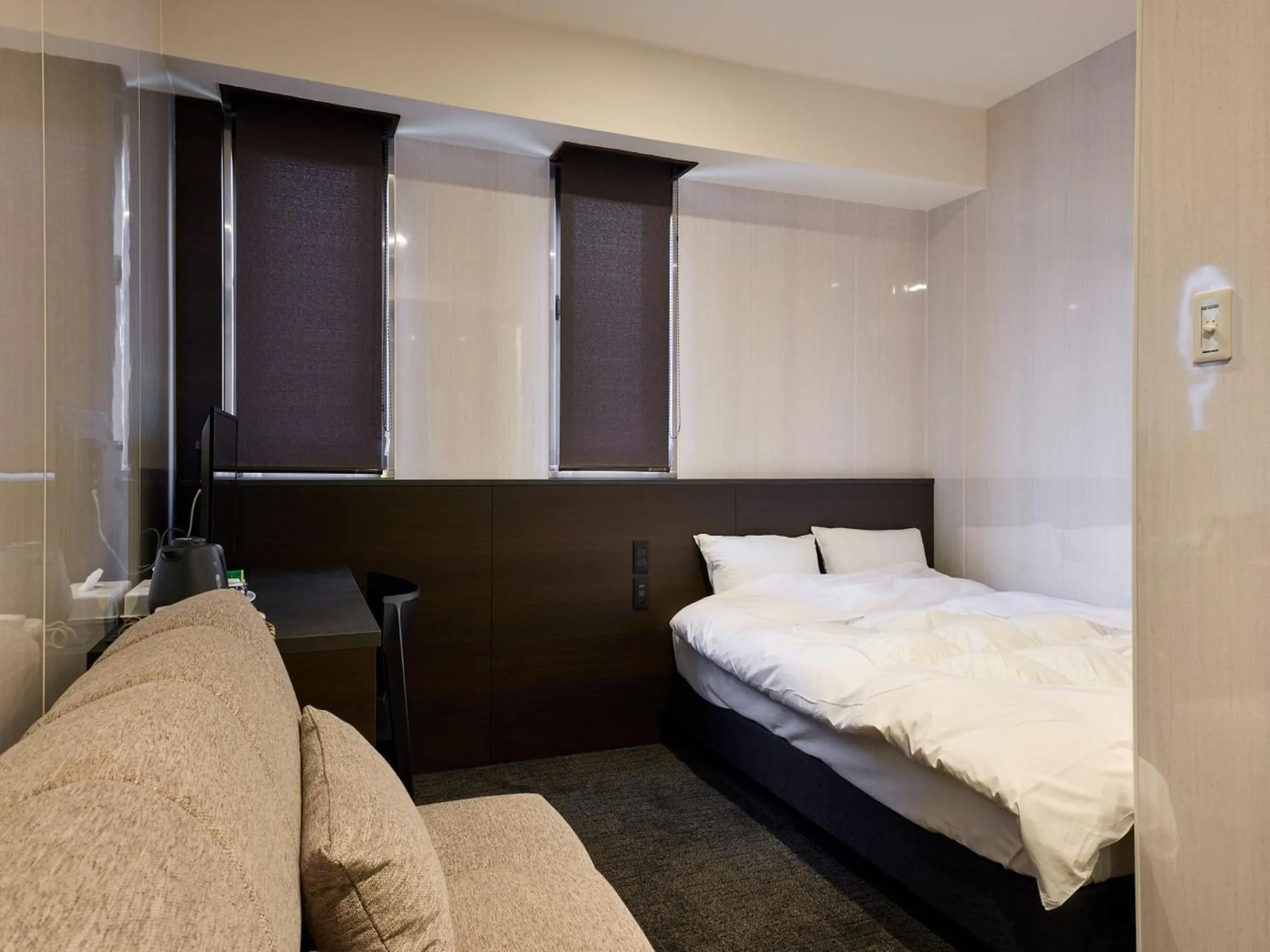 Bed in Hotel Wakamizu