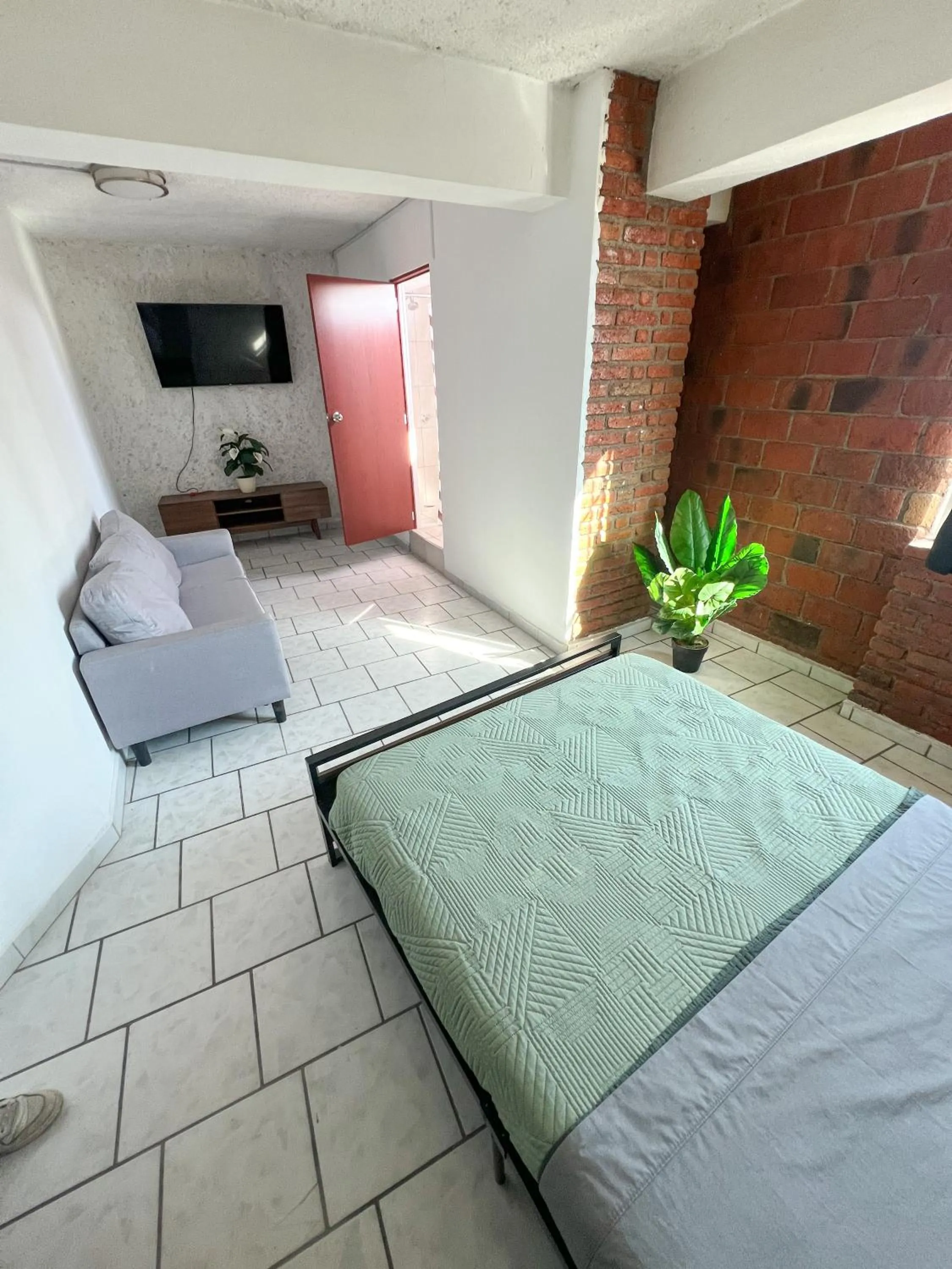 Bed in Hotel RJ Querétaro