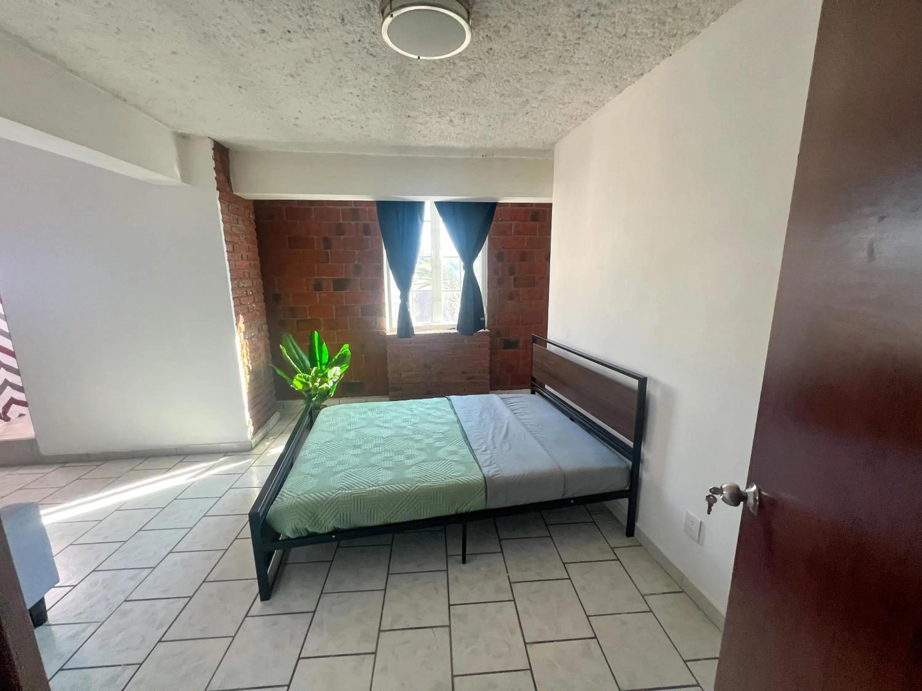 Bed in Hotel RJ Querétaro