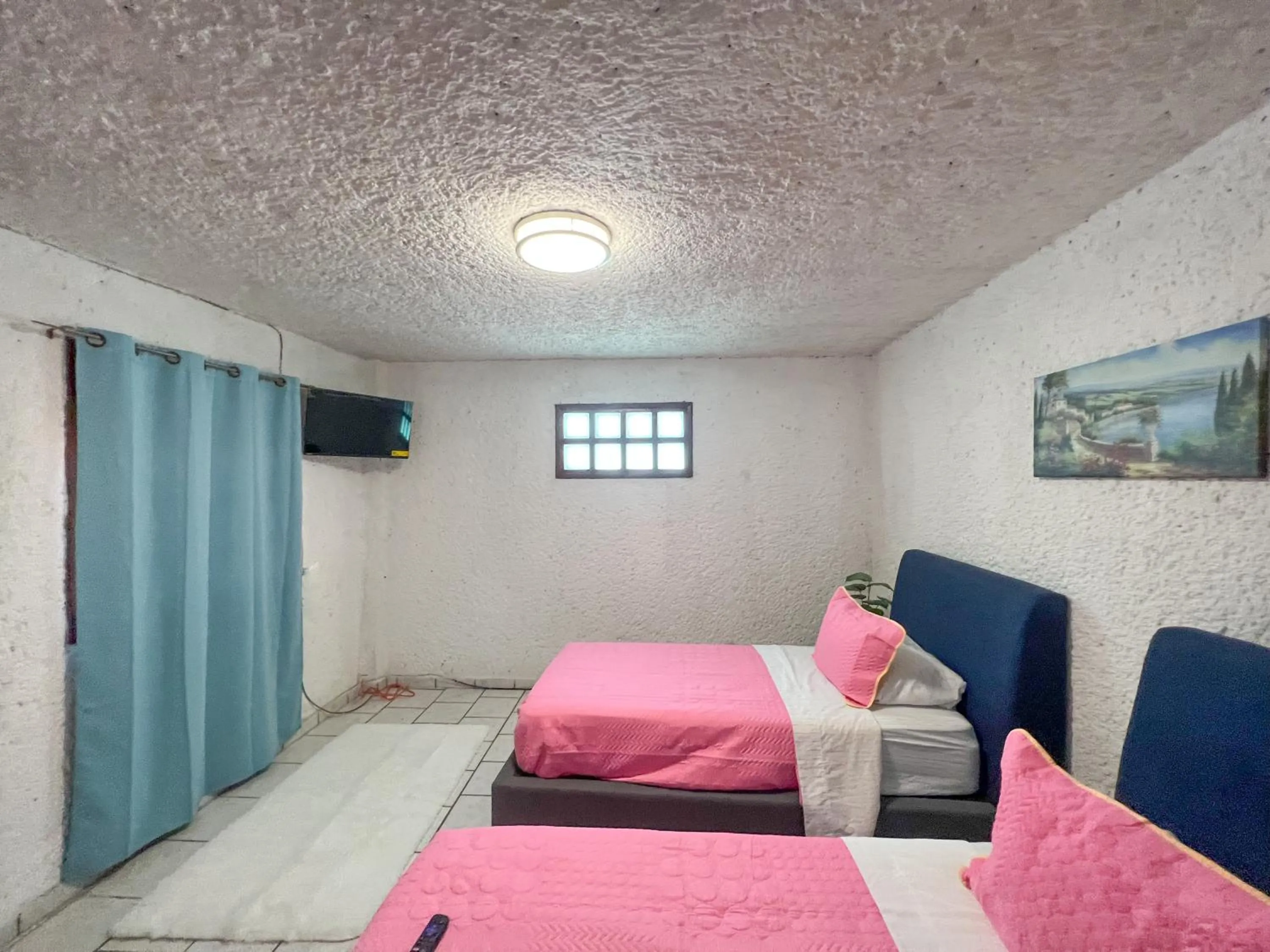 Bed in Hotel RJ Querétaro