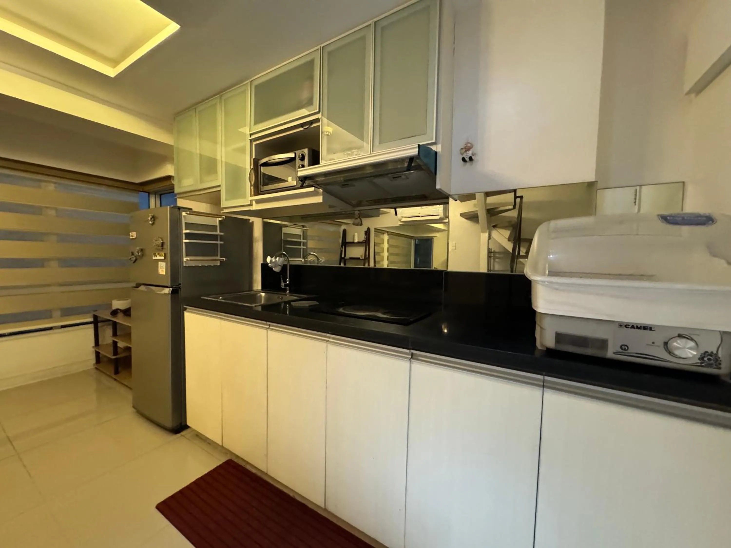 Cozi Modern Loft Suite near high street BGC wifi pool