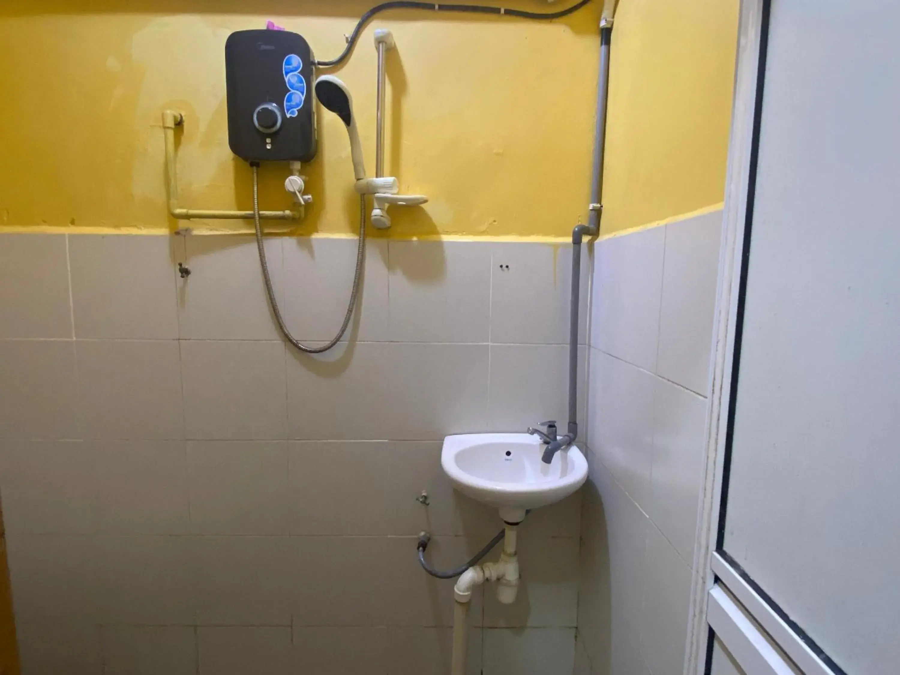 Bathroom in Hotel O De Anjung Bathroom in Hotel O De Anjung
