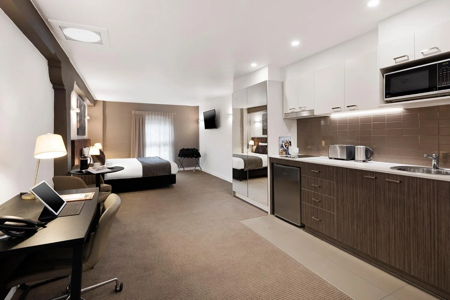 Kitchen or kitchenette, Bed in Quest Newcastle West
