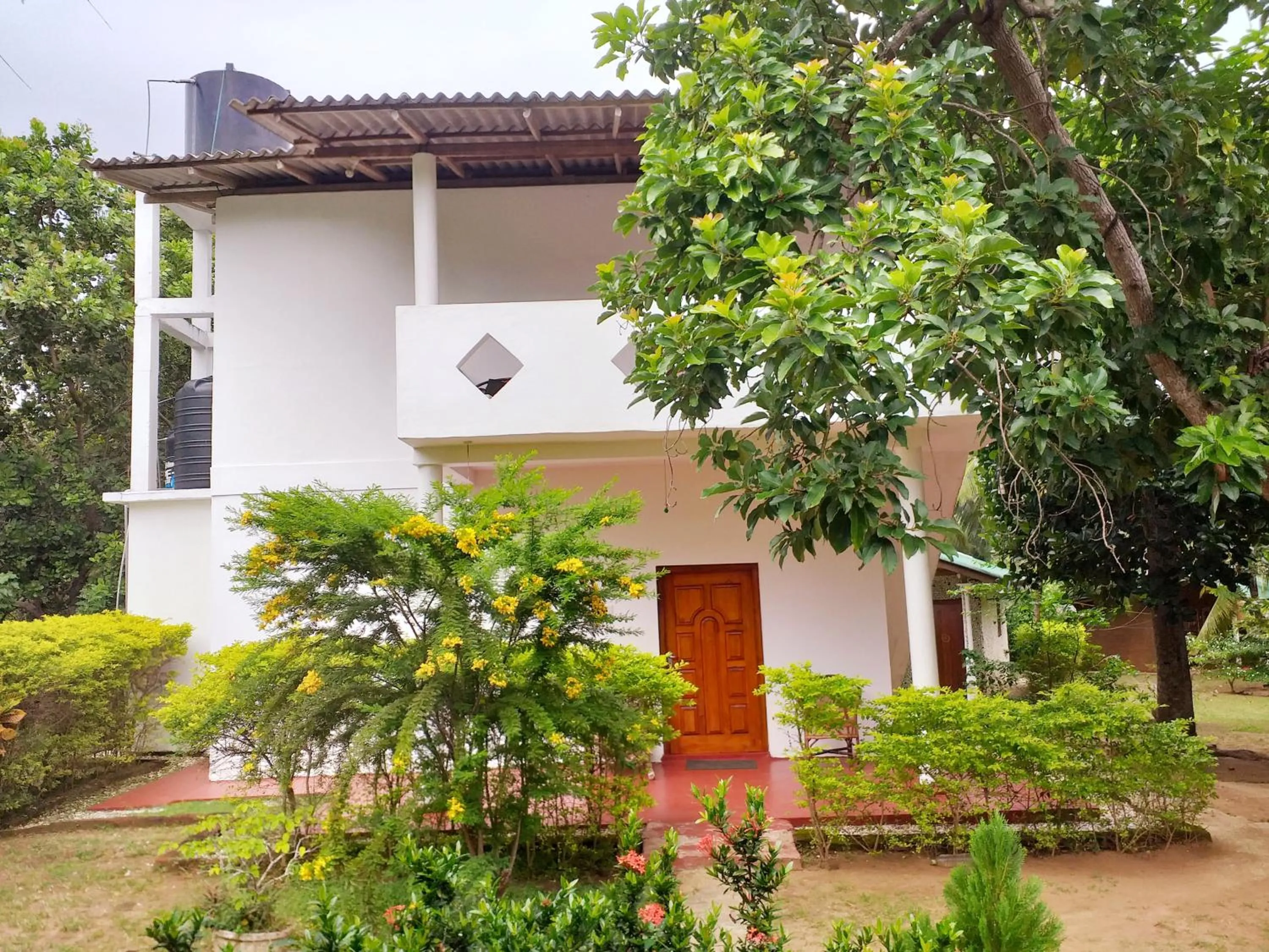 Double Room with Patio in Peacock Family Stay