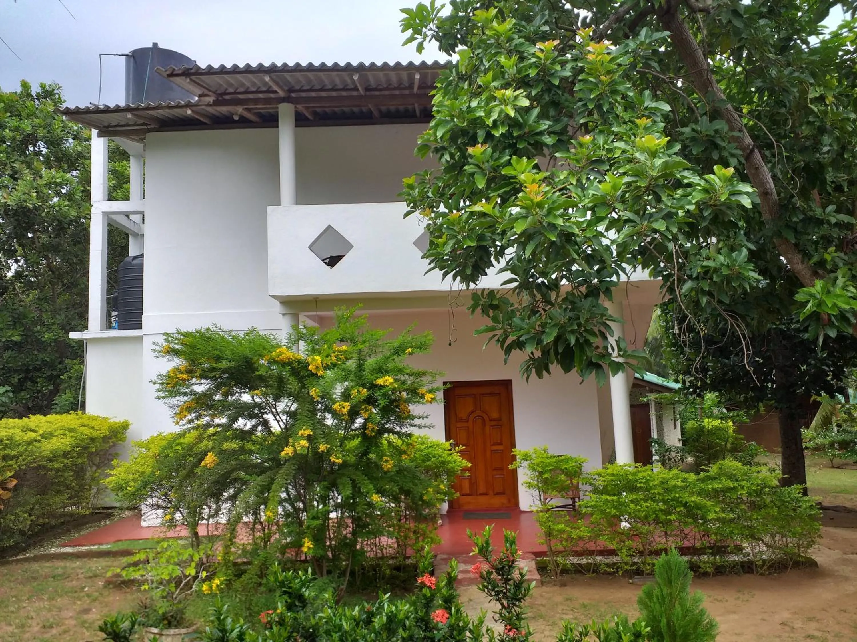 Double Room with Balcony in Peacock Family Stay