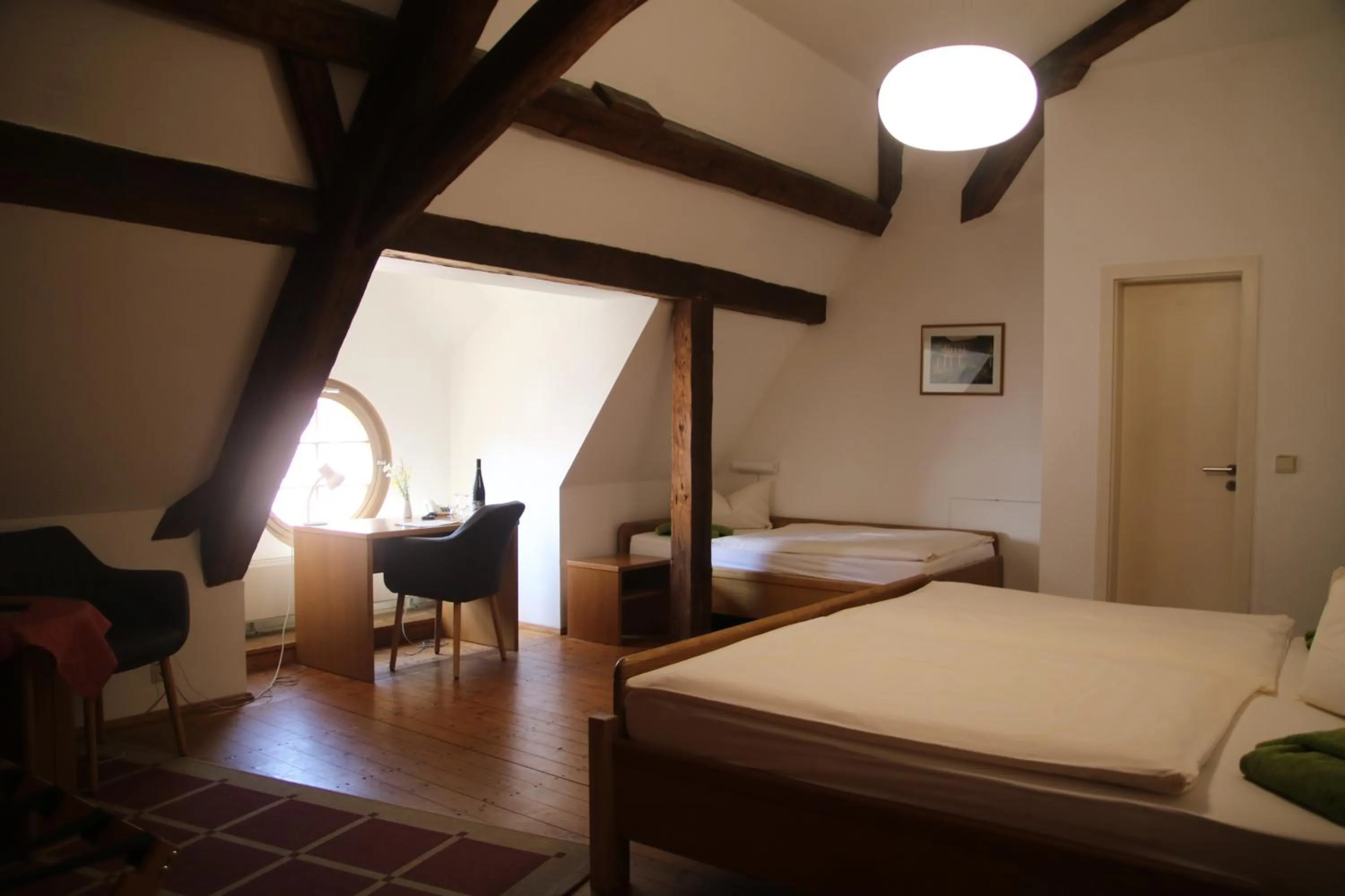 Photo of the whole room, Bed in Gästehäuser St. Marienthal