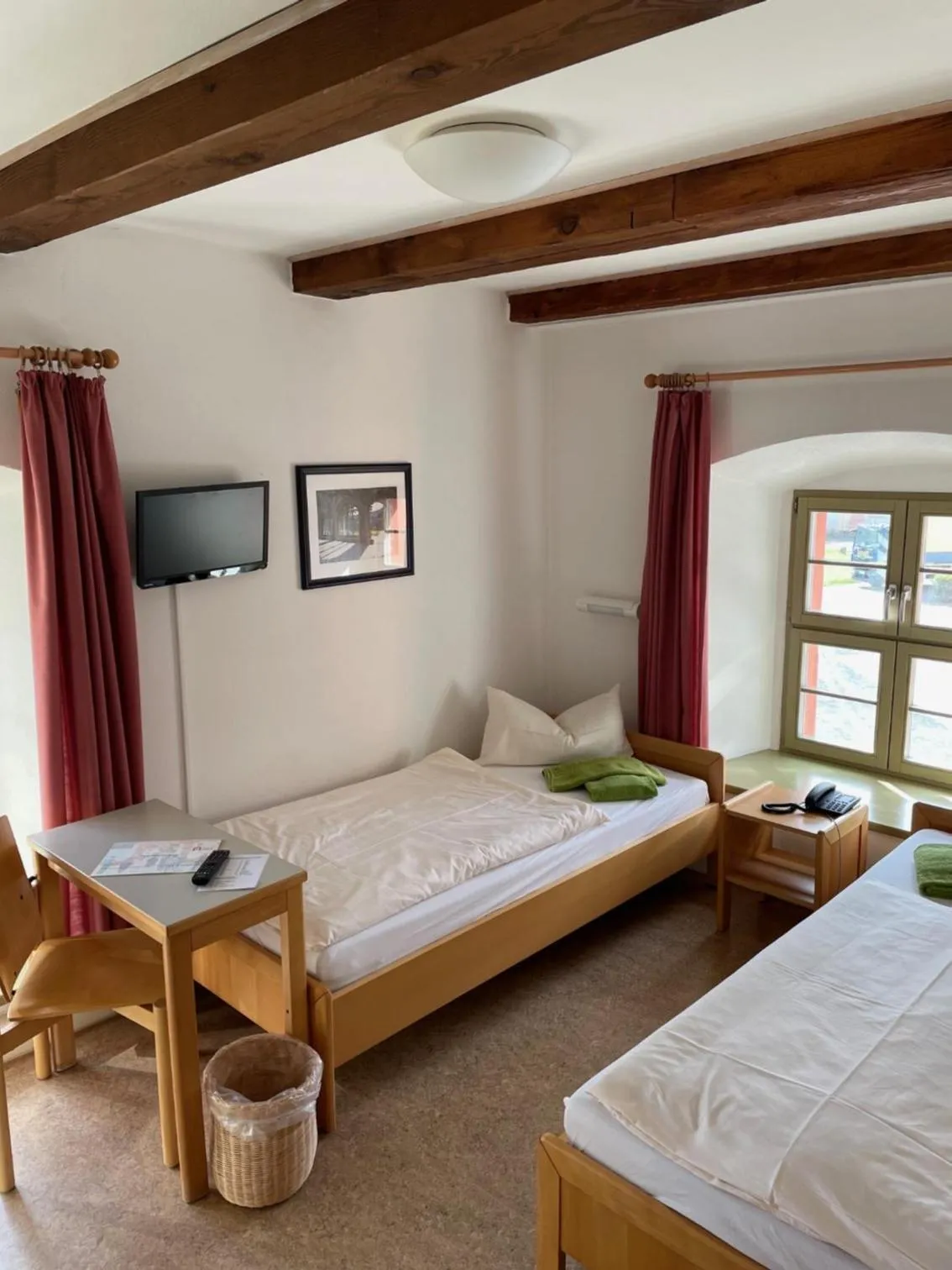 Photo of the whole room, Bed in Gästehäuser St. Marienthal