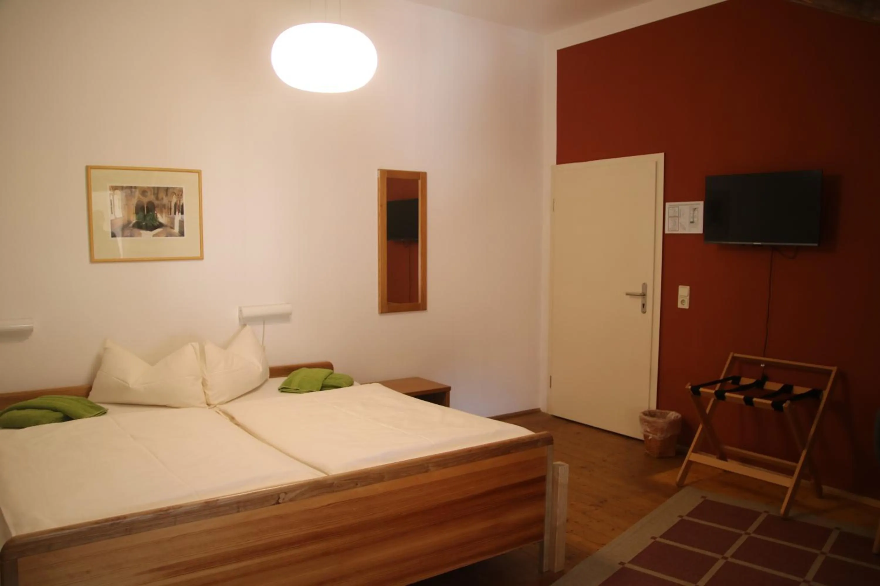 Photo of the whole room, Bed in Gästehäuser St. Marienthal