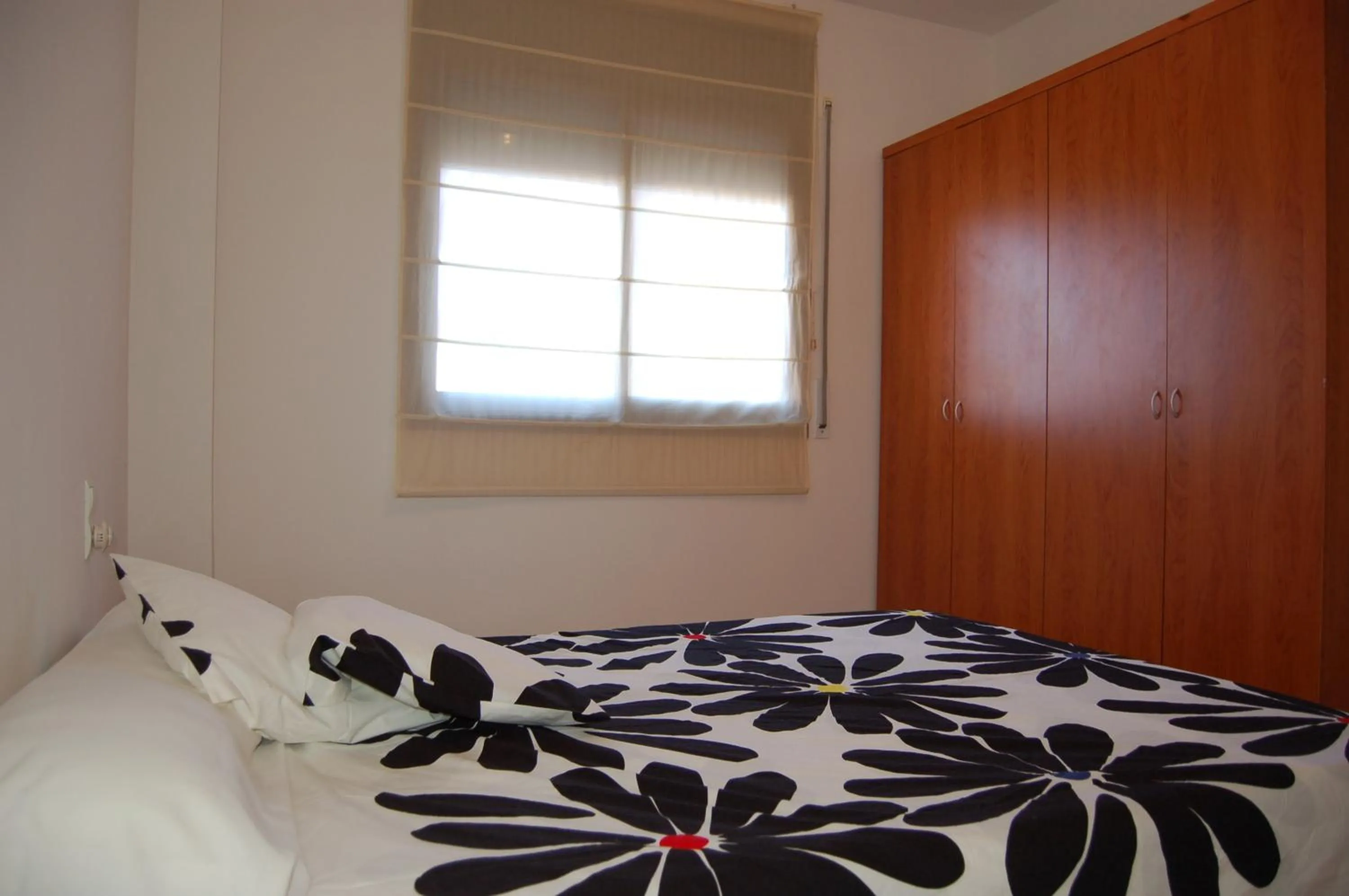 Bed in Apartamentos Santa Barbara II