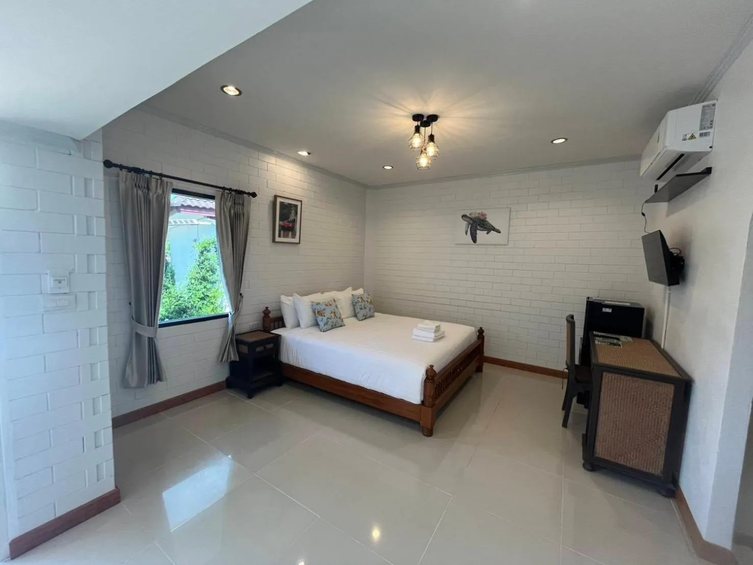 Bed in Kenikar Raintree Resort Chumphon