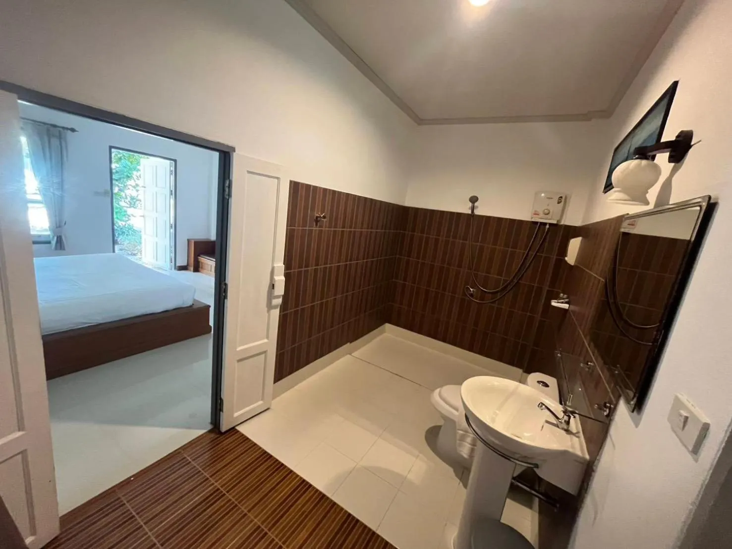 Bed in Kenikar Raintree Resort Chumphon