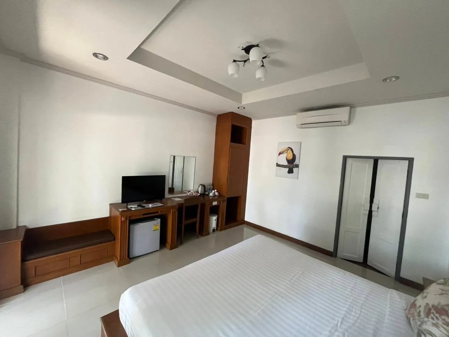 Bed in Kenikar Raintree Resort Chumphon