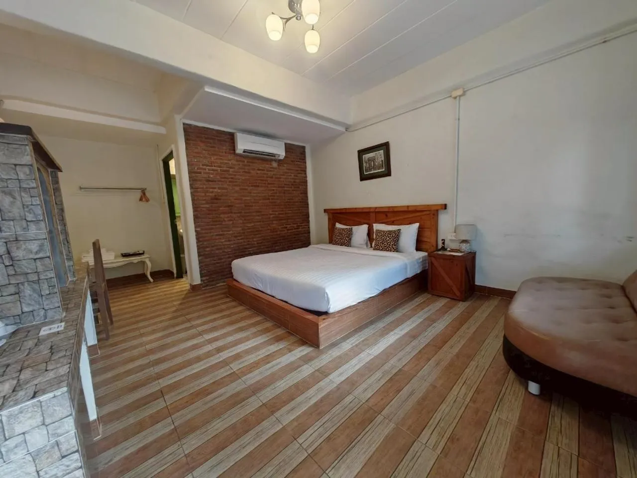 Bed in Kenikar Raintree Residence Hotel