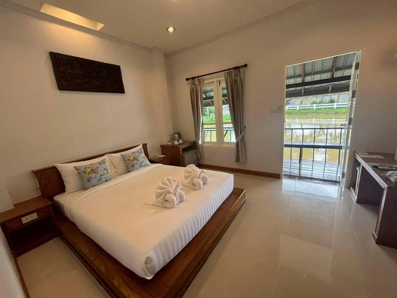 Photo of the whole room, Bed in Kenikar Raintree Residence Hotel